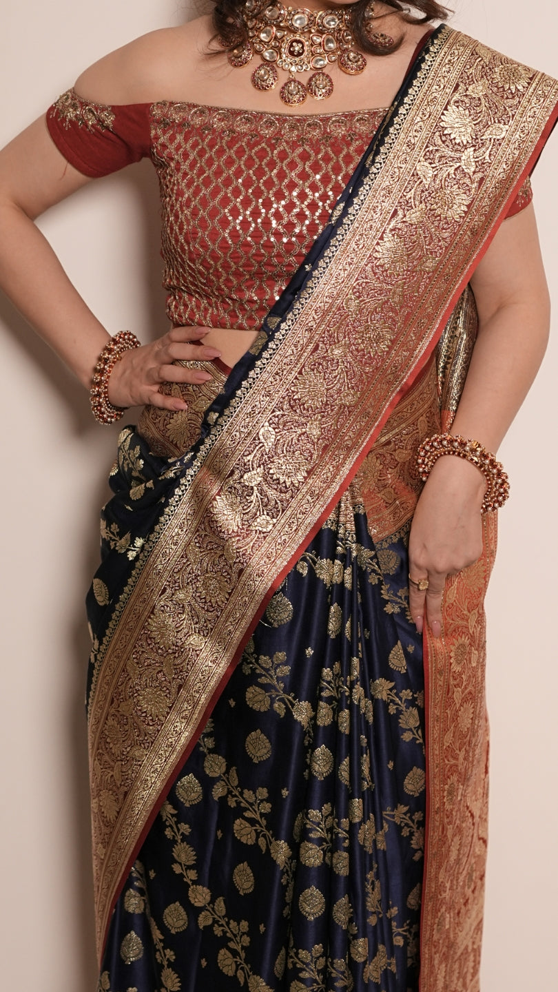 Red and Blue Dual Tone Pure Banarasi Saree with All-Over Floral and Hand Embroidery Border.