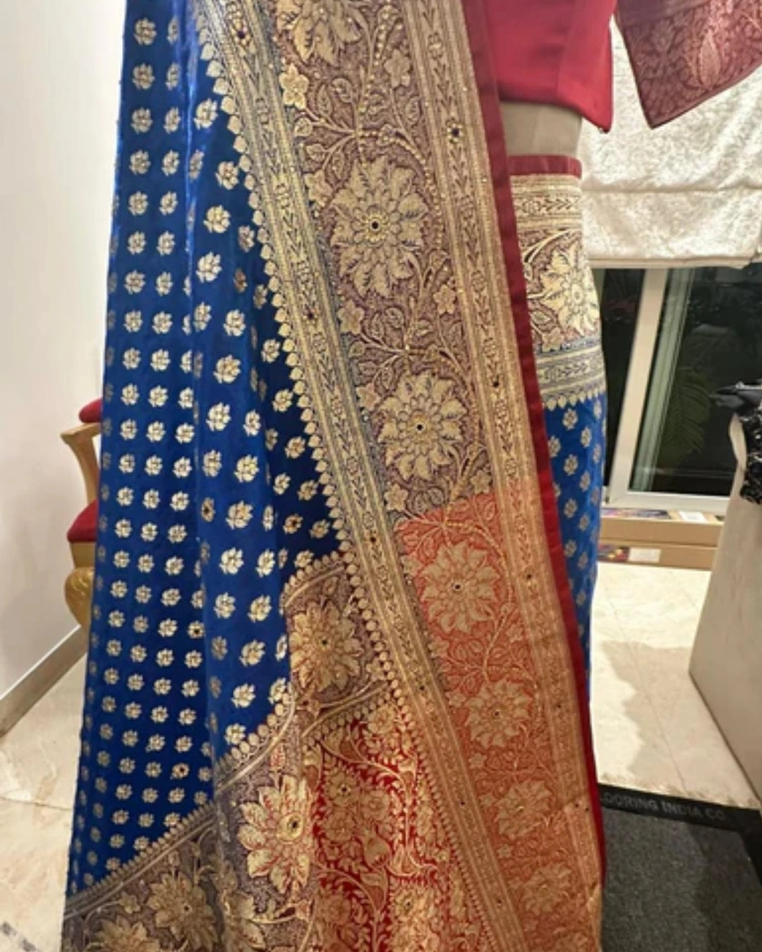 Royal Blue Pure Banarasi Silk Saree with Gold Zari Border and Red Zari-Detailed Sleeve Blouse