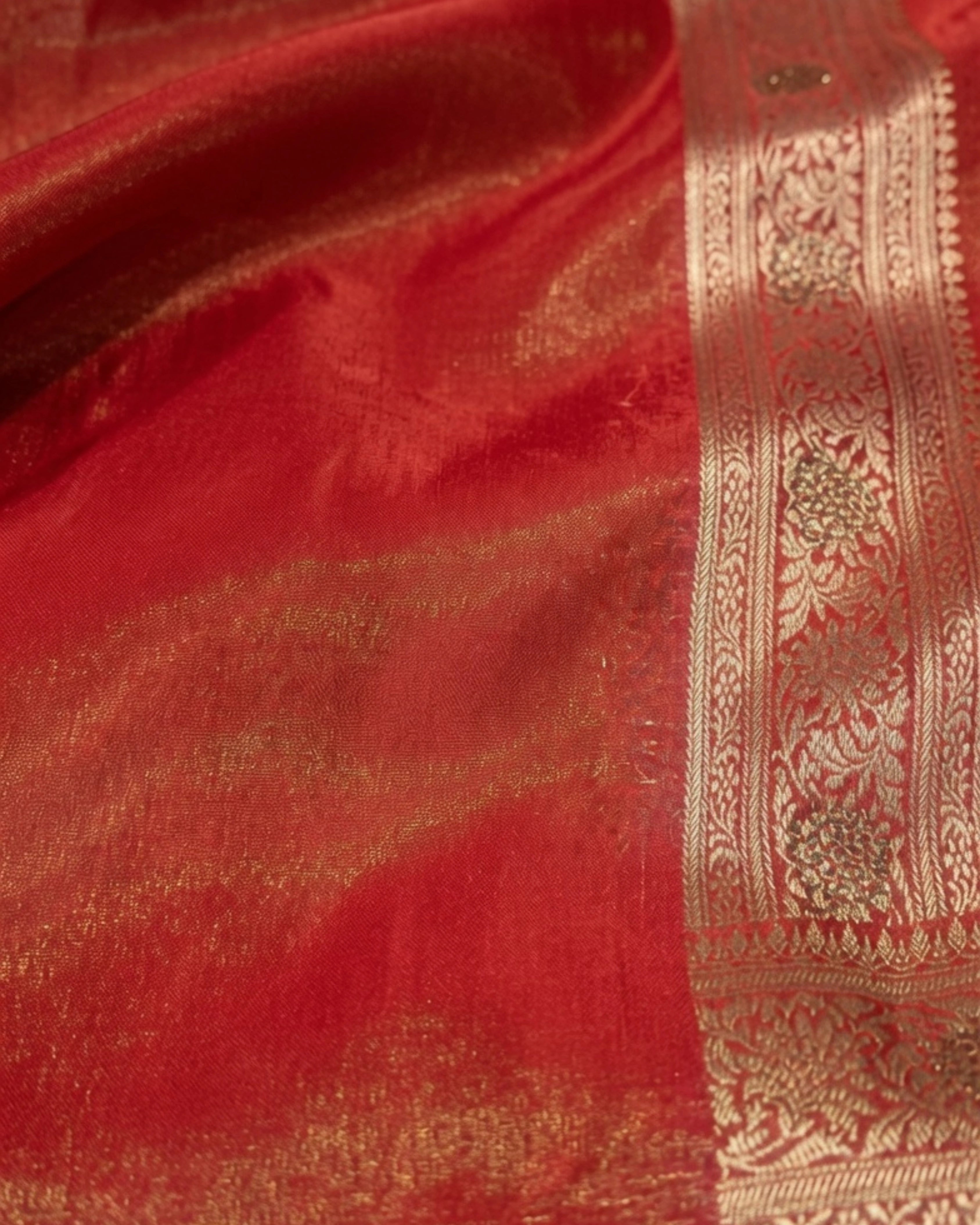 Orange Banarasi Silk Saree with All-Over Gold Zari Floral Design and Matching Blouse