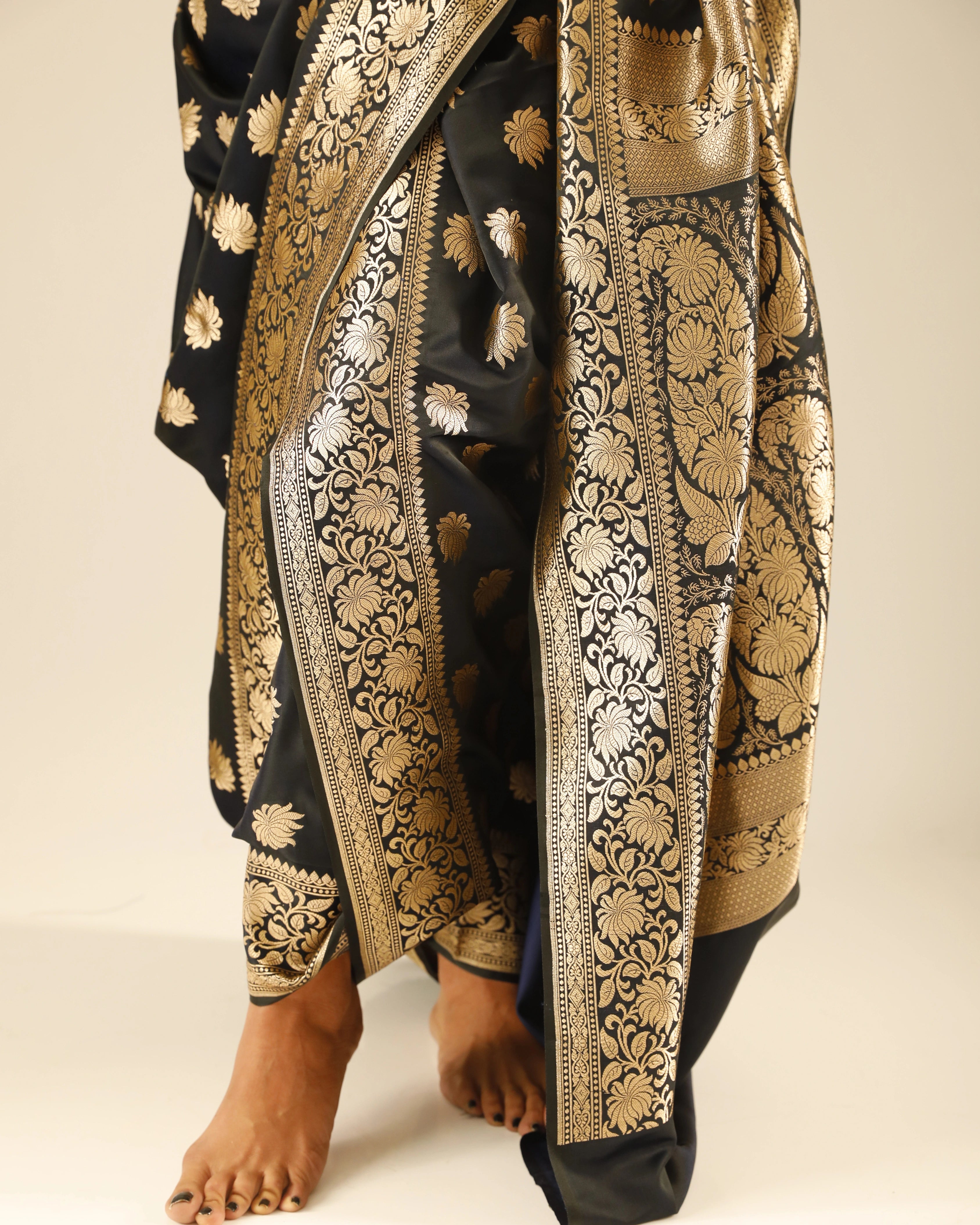 Black Banarasi Saree with Gold Floral Work and Black Feather Top