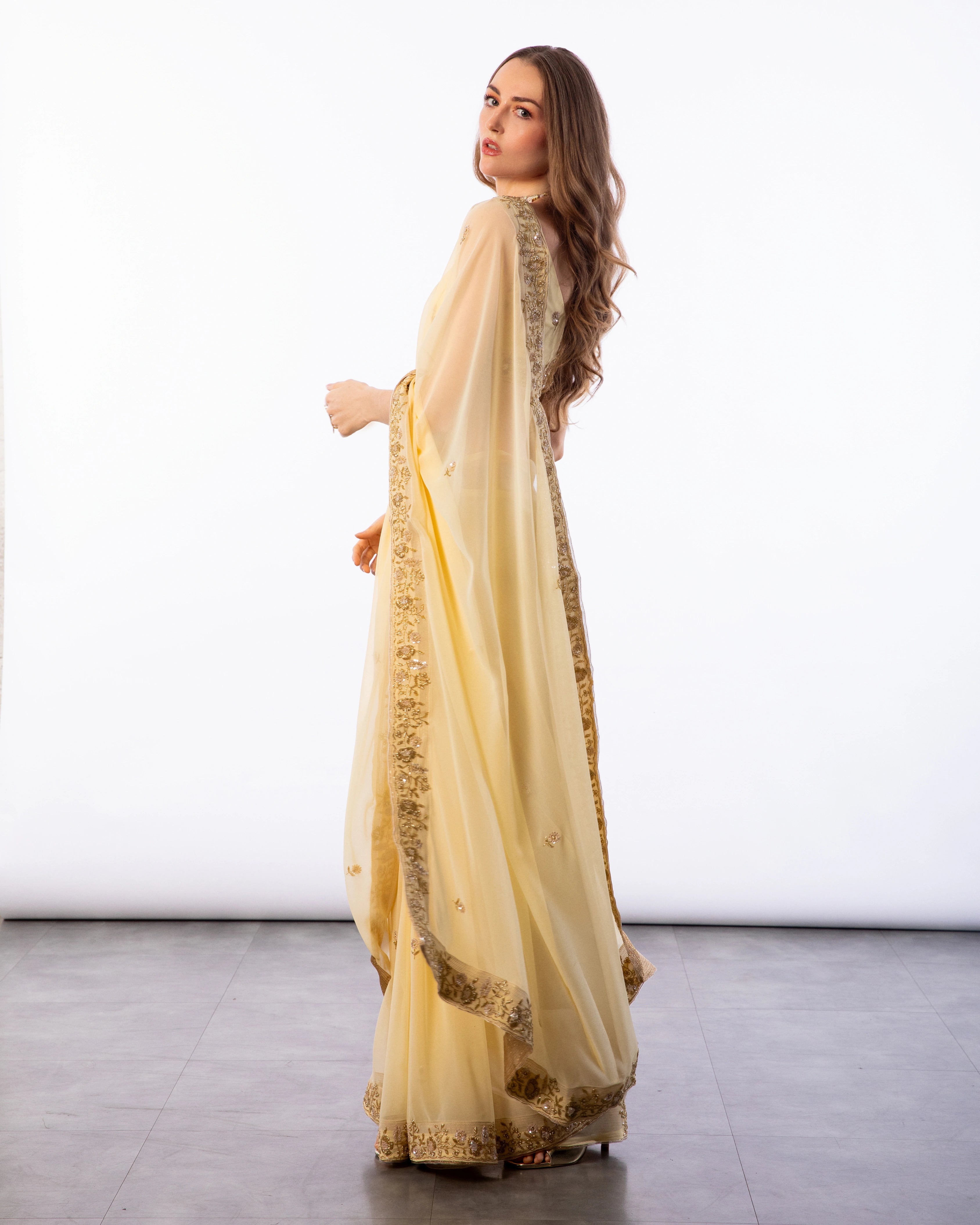 Yellow Hand Embroidered Georgette Saree and Matching Floral Embroidered Blouse