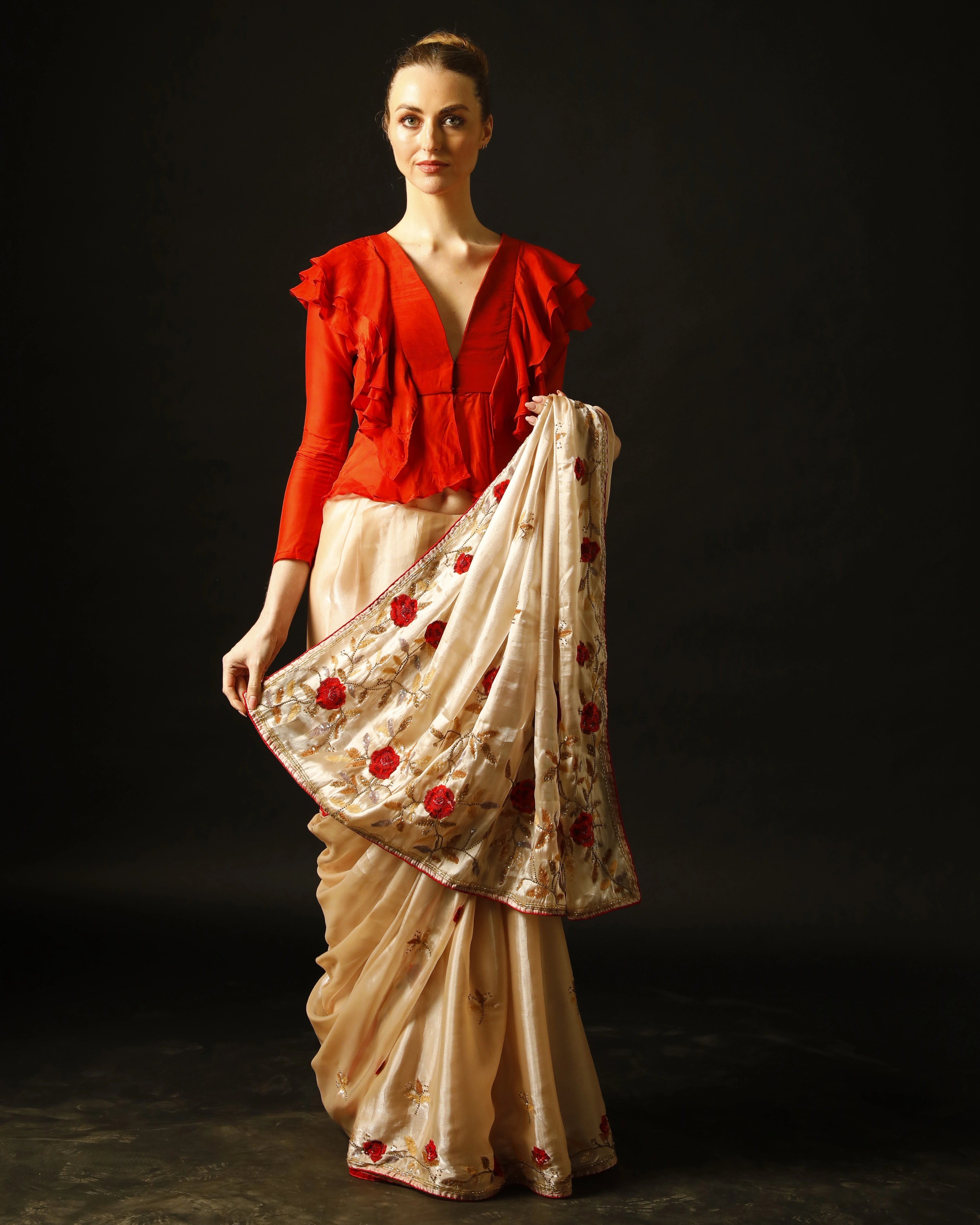 Cream Silk Saree with All-Over Hand Embroidery and Red Tailored Ruffle Blouse