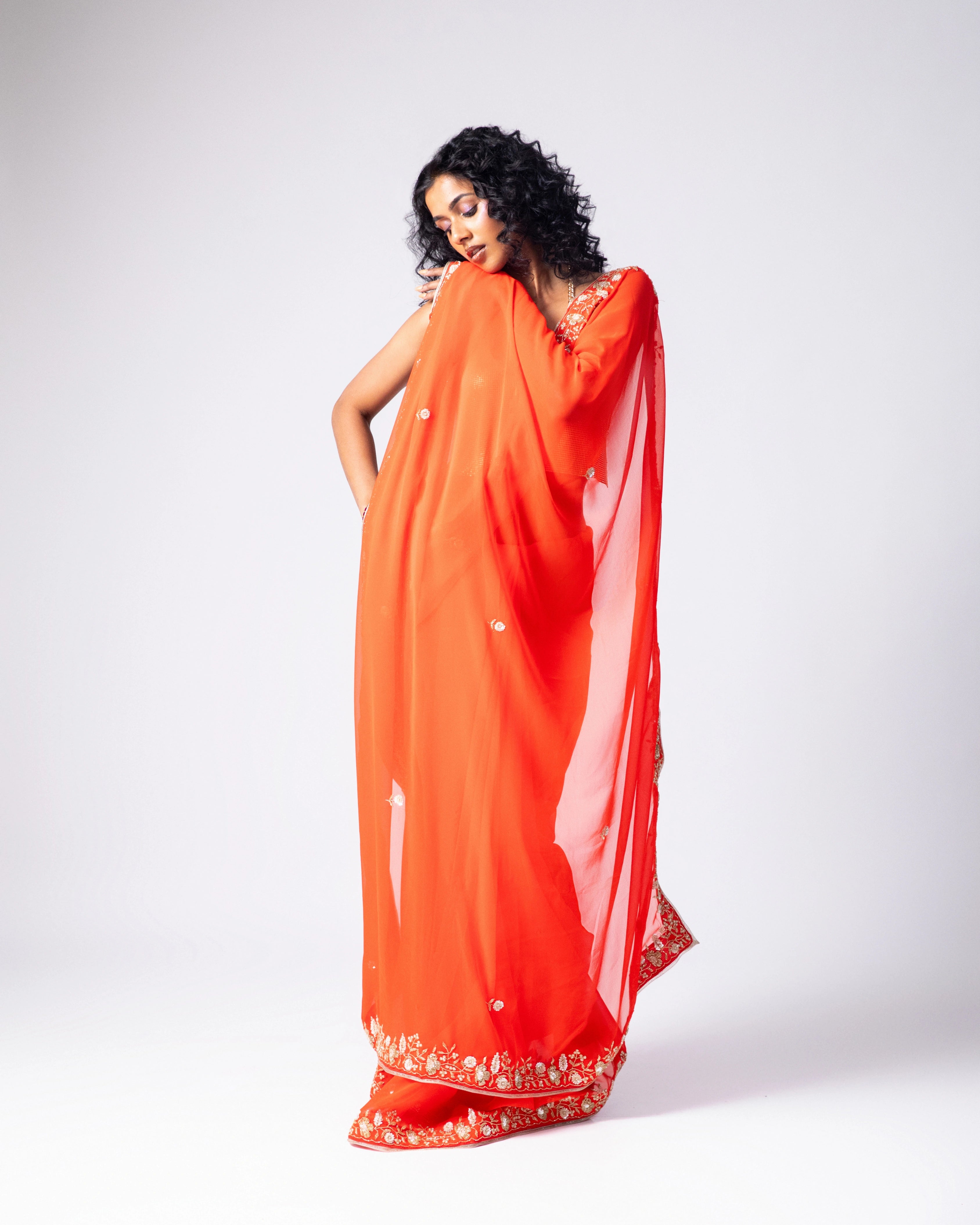 Orange Hand Embroidered Georgette Saree and Gold Metallic Blouse