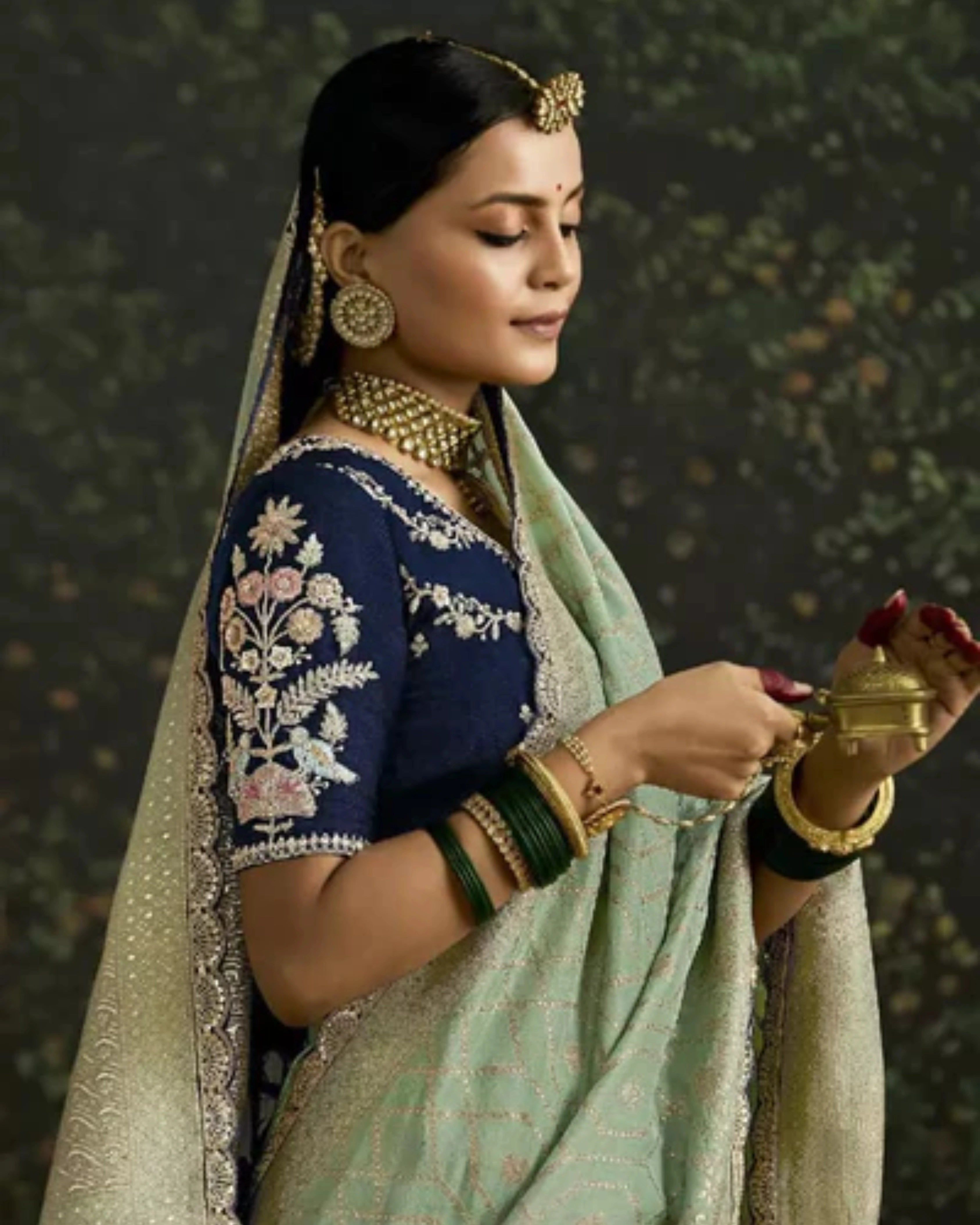 Mint Green Heavy Silk Saree with Gold Zari and Embroidery Work All-Over & Heavy Embroidery Navy Blue Blouse