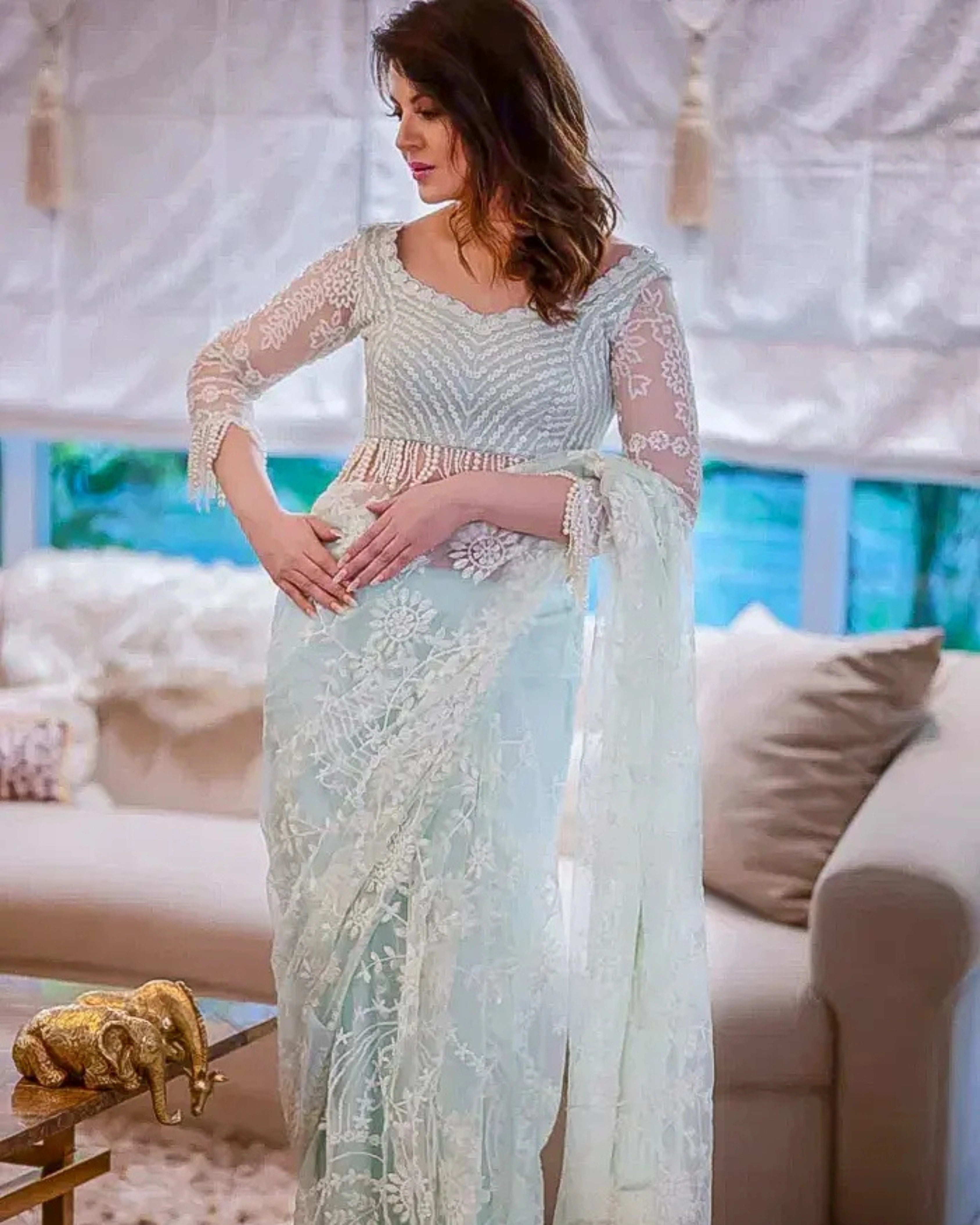 Mint Green and White Net Saree with Floral Stone Work Heavy Sequin Embroidery and a Matching Full Sleeves Blouse