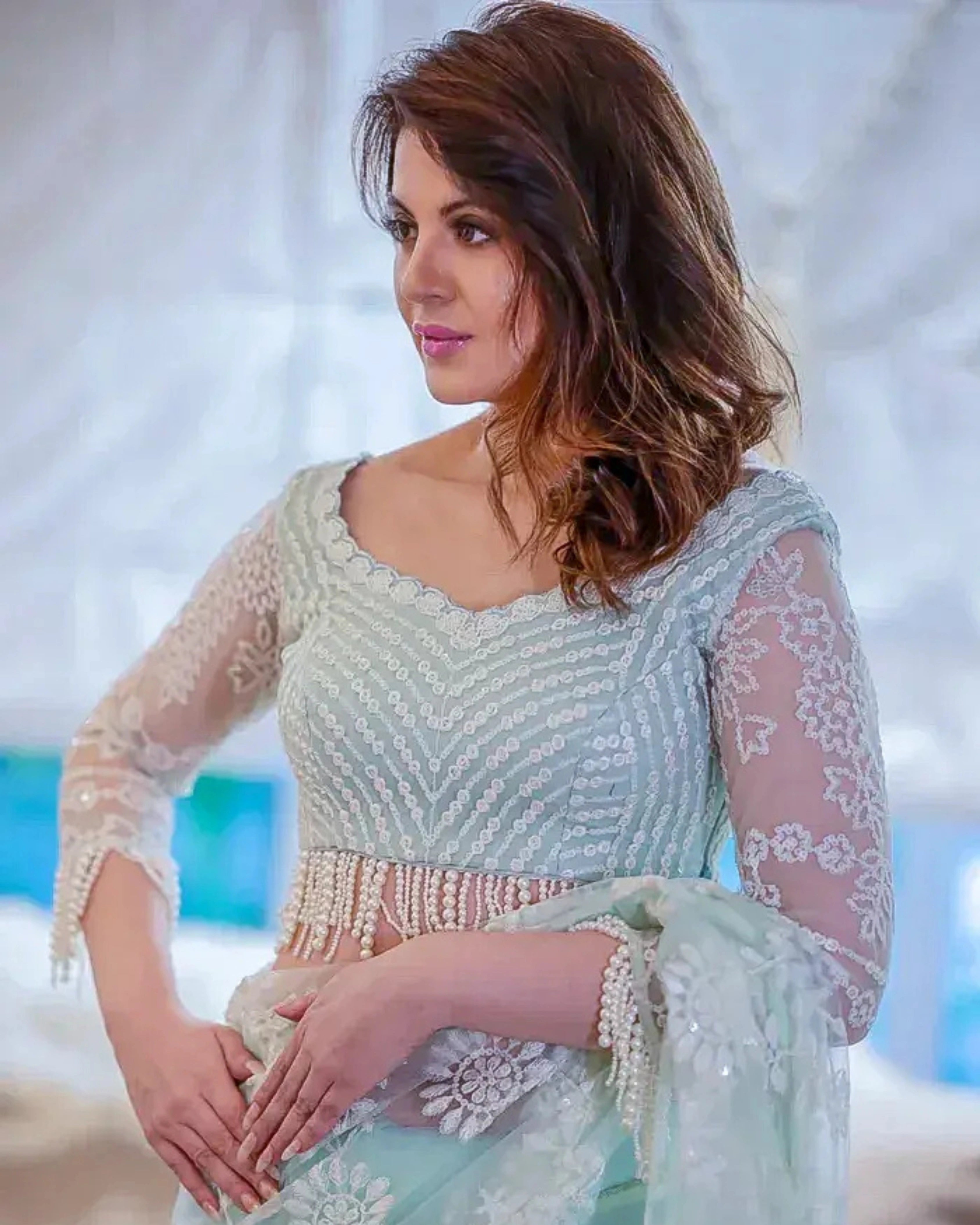 Mint Green and White Net Saree with Floral Stone Work Heavy Sequin Embroidery and a Matching Full Sleeves Blouse