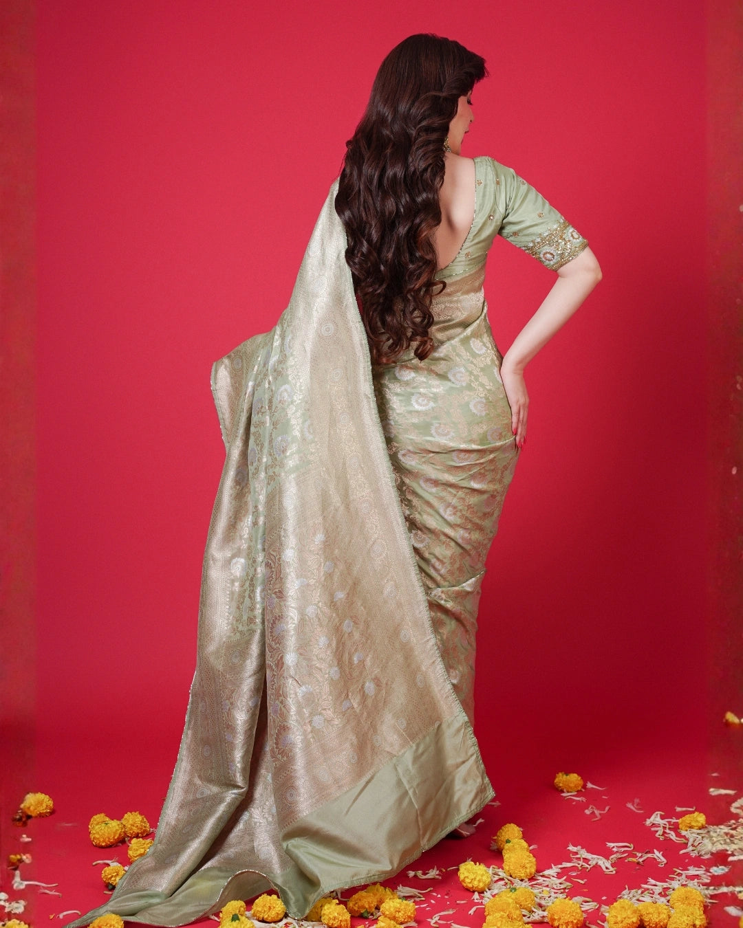 Light Green Pure Banarasi Silk Saree with Gold Floral Design and Matching Blouse.
