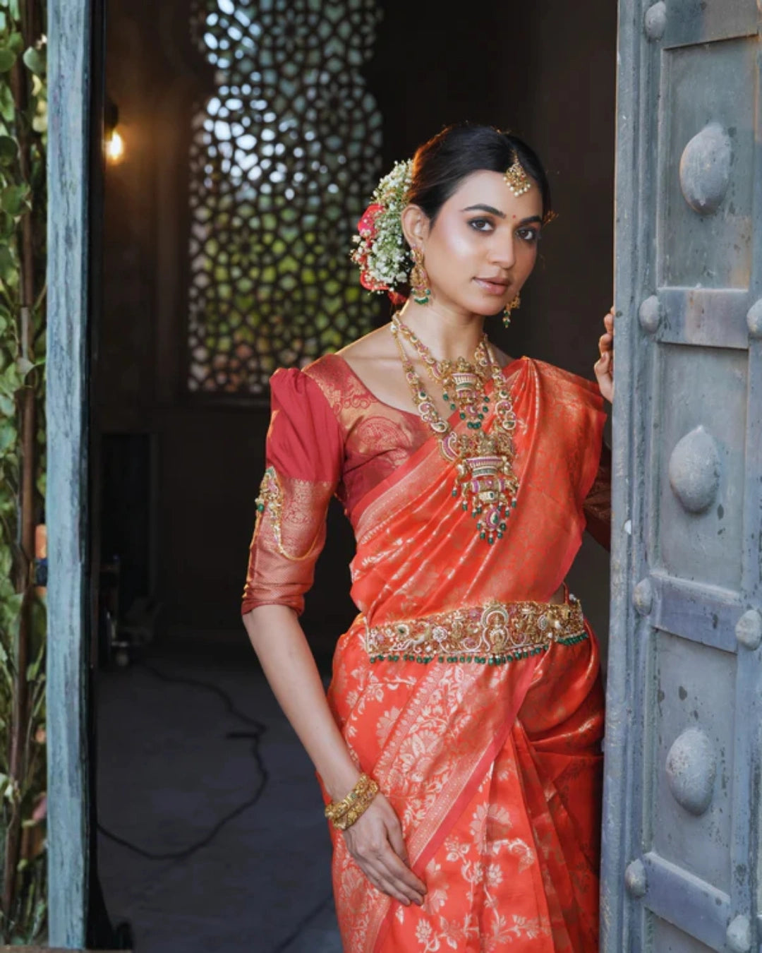 Orange Silk Saree with All-over Golden Zari Floral Weaving with Matching Blouse
