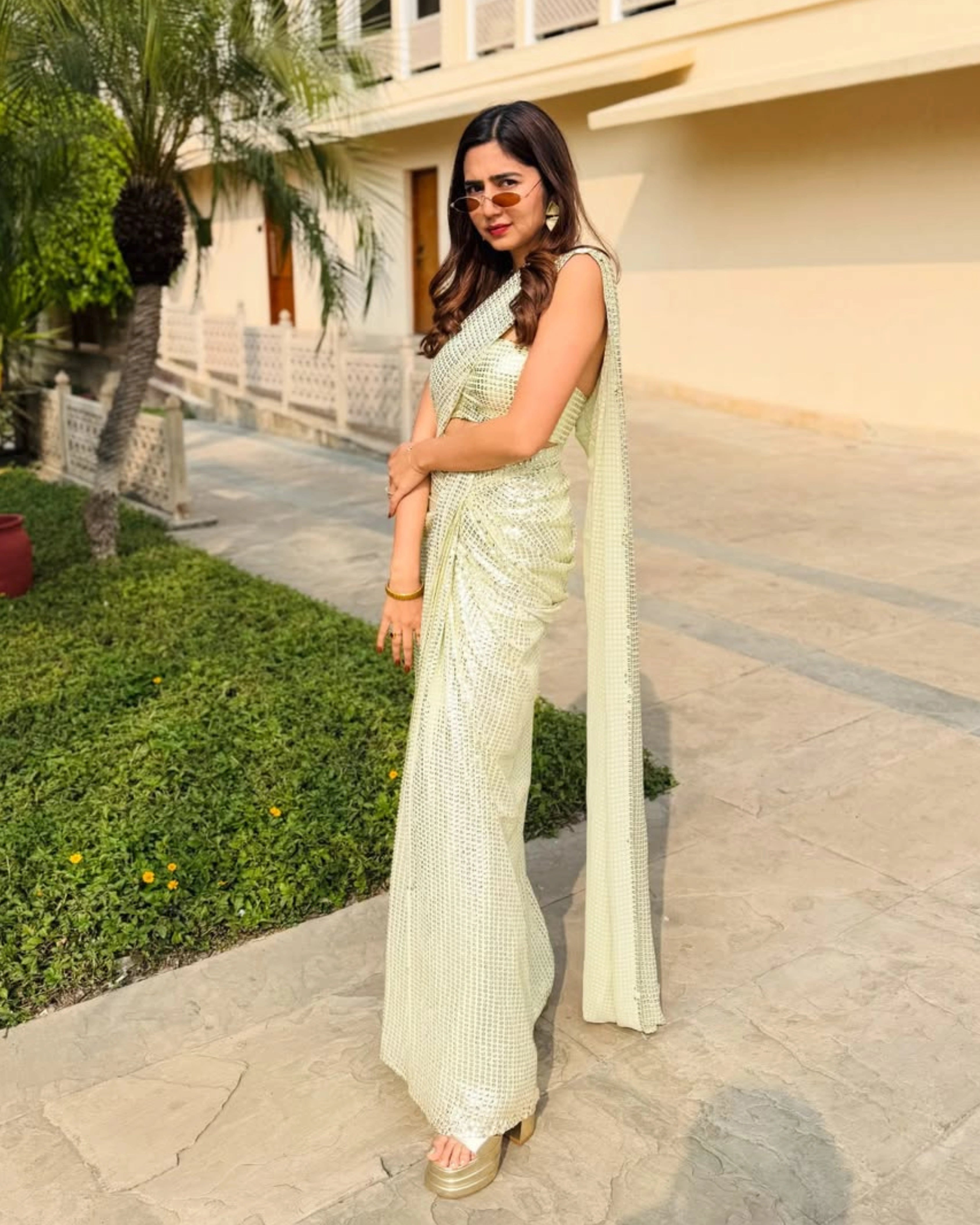 Yellow Georgette Saree with All-Over Gold Sequin Work