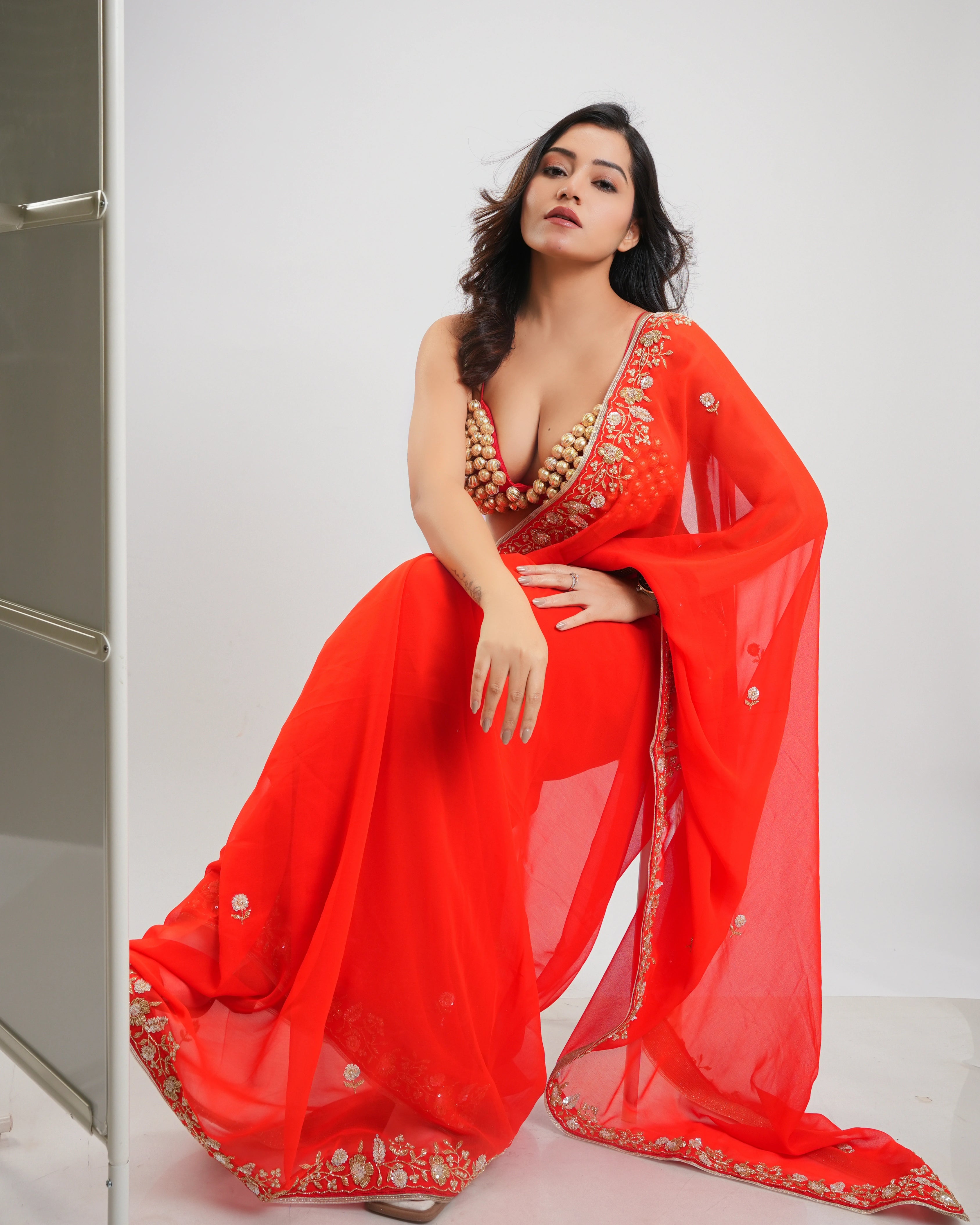 Orange Hand Embroidered Georgette Saree and Customized Blouse