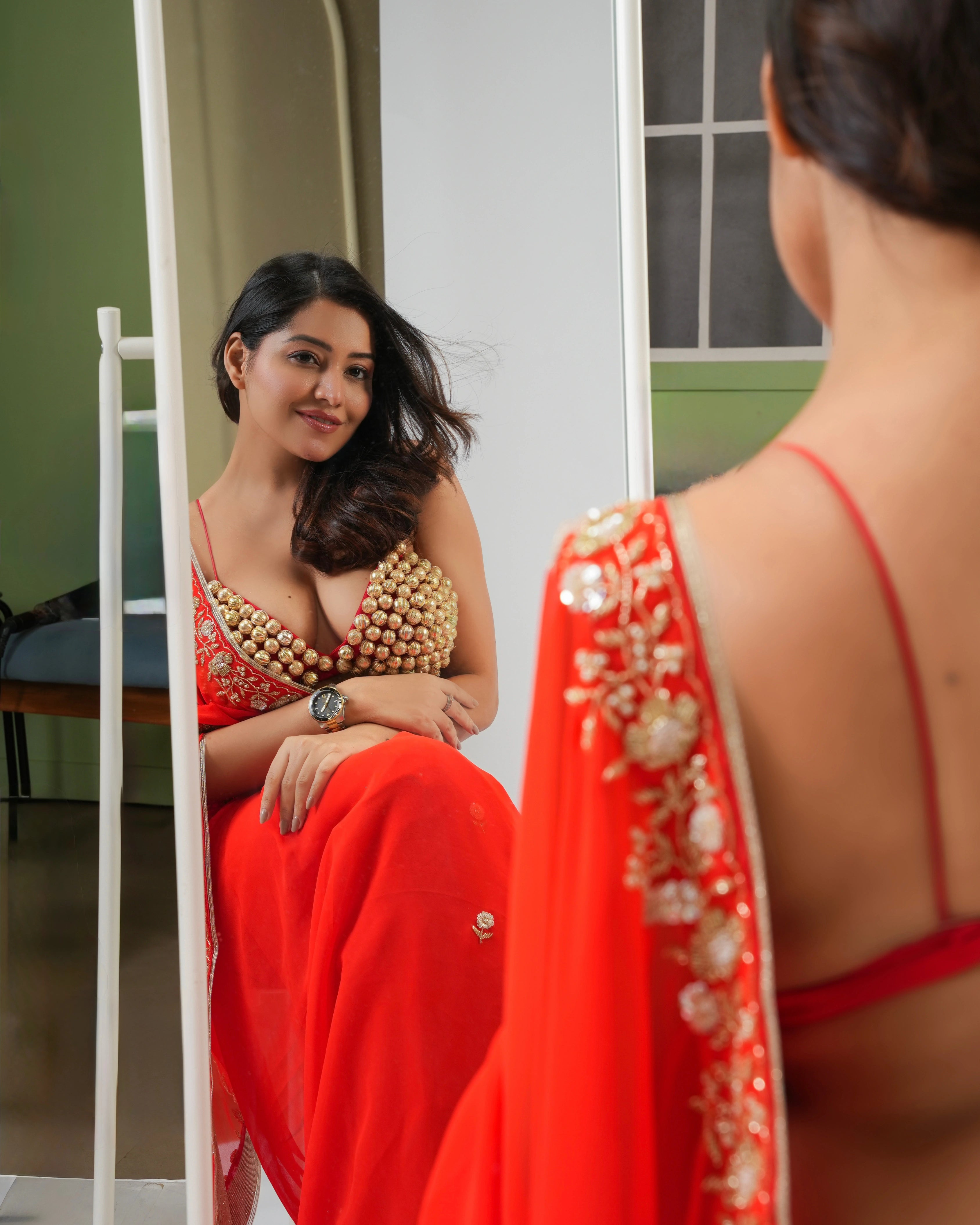Orange Hand Embroidered Georgette Saree and Customized Blouse