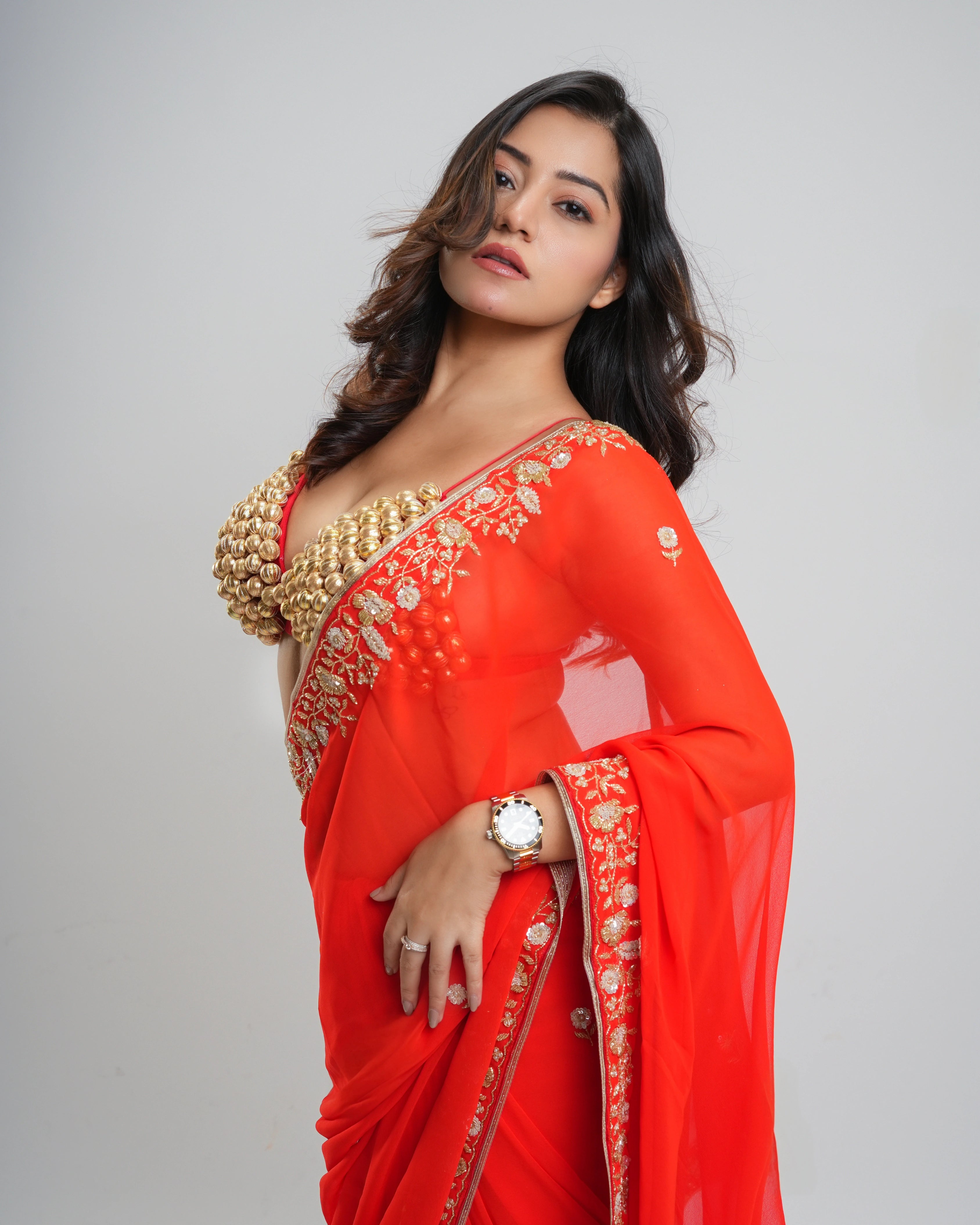 Orange Hand Embroidered Georgette Saree and Customized Blouse
