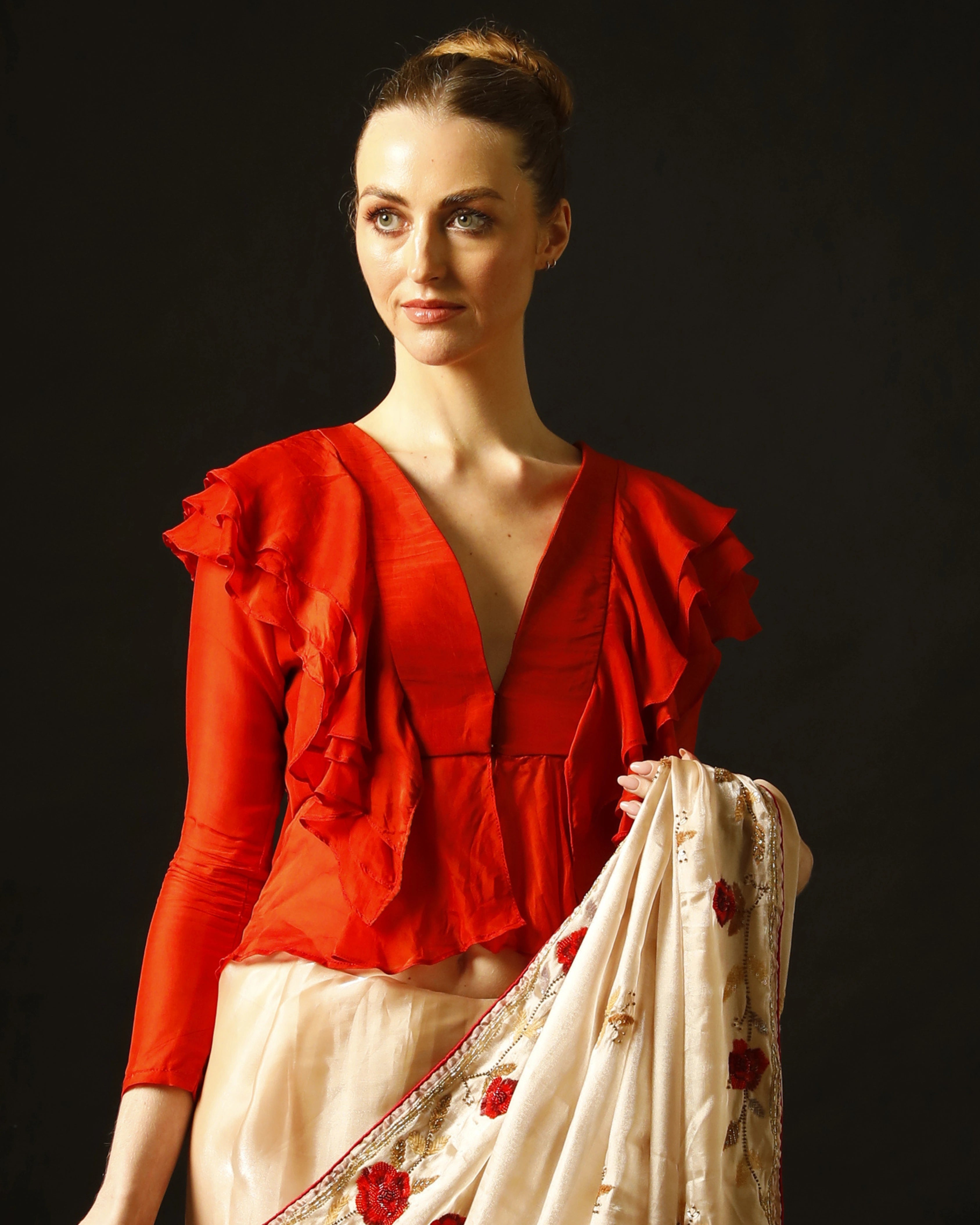 Cream Silk Saree with All-Over Hand Embroidery and Red Tailored Ruffle Blouse