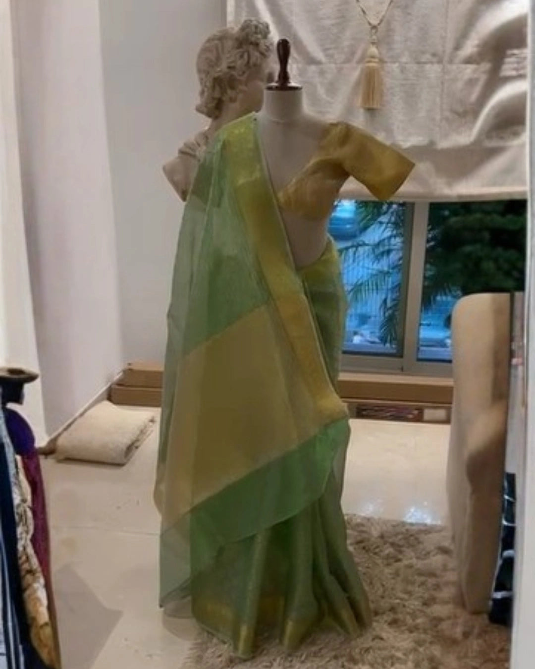Green Banarasi Organza Silk Saree with Dual Tone Dotted Checks Pattern and Leaf Design Gold Zari Border