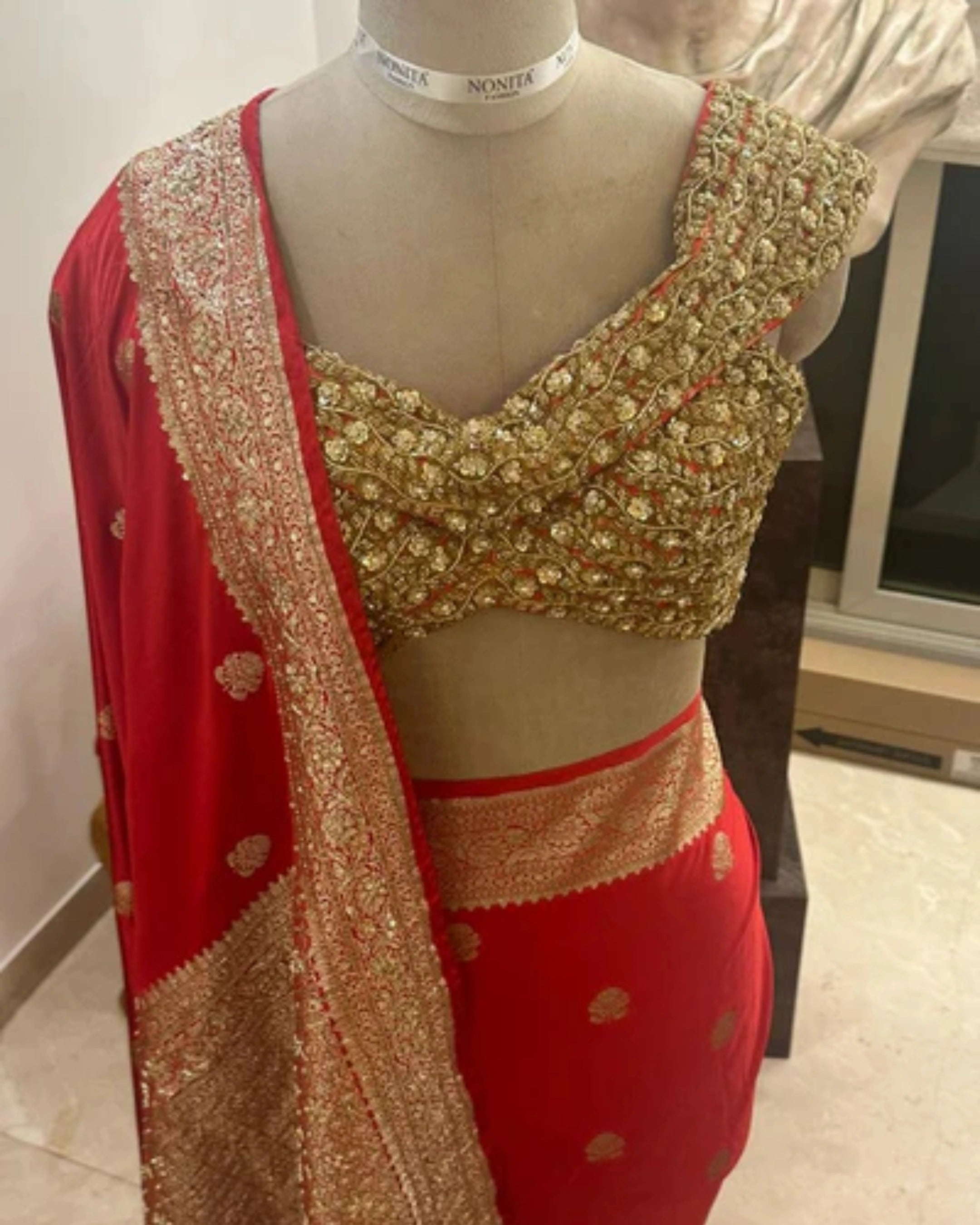 Red Pure Banarasi Silk Saree with All-Over Floral Design and Hand-Embroidered Mirror and Zardosi Blouse