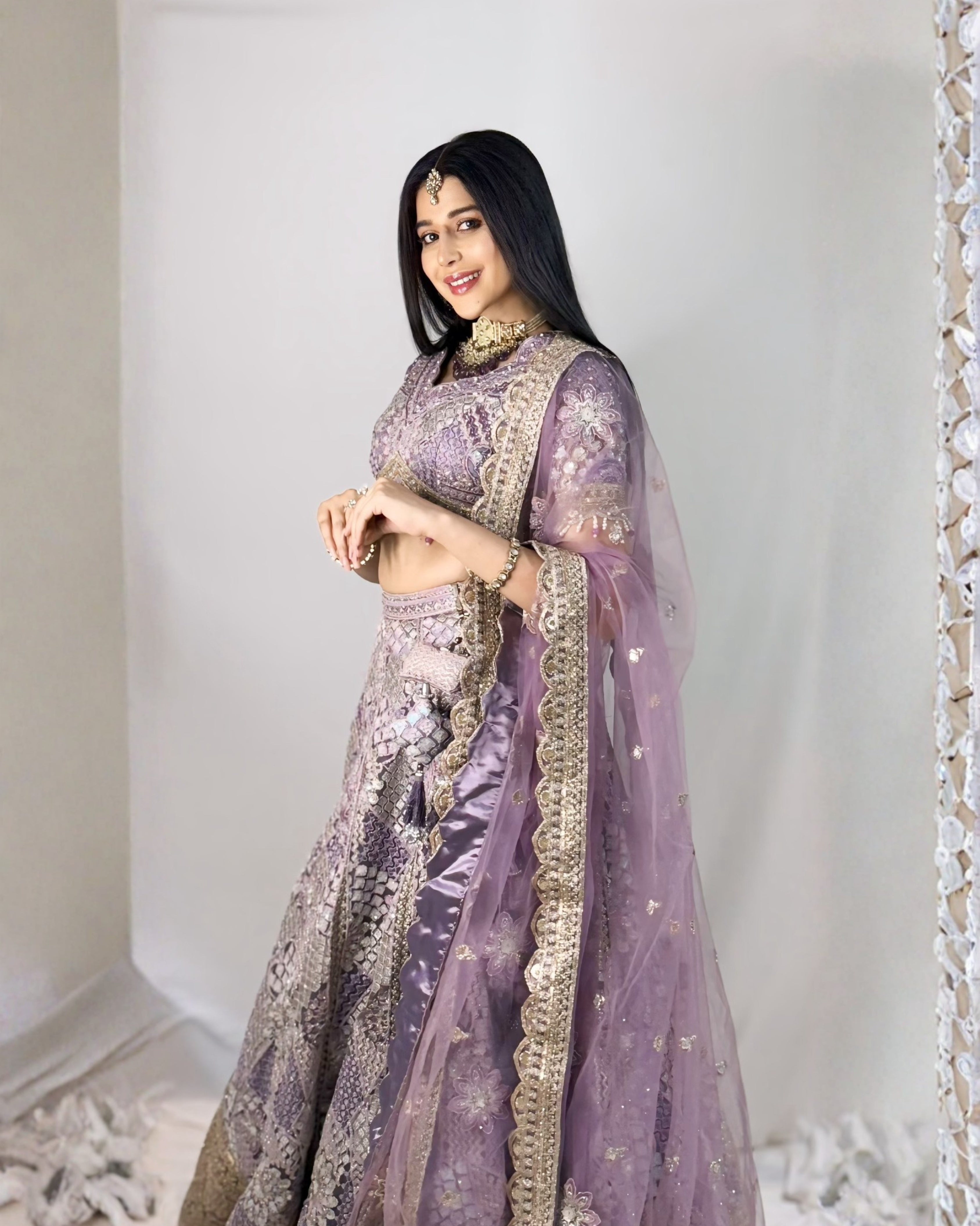 Lavender Silk Lehenga with Floral Embroidery Mirror Stonework and Gold Zari Border Work