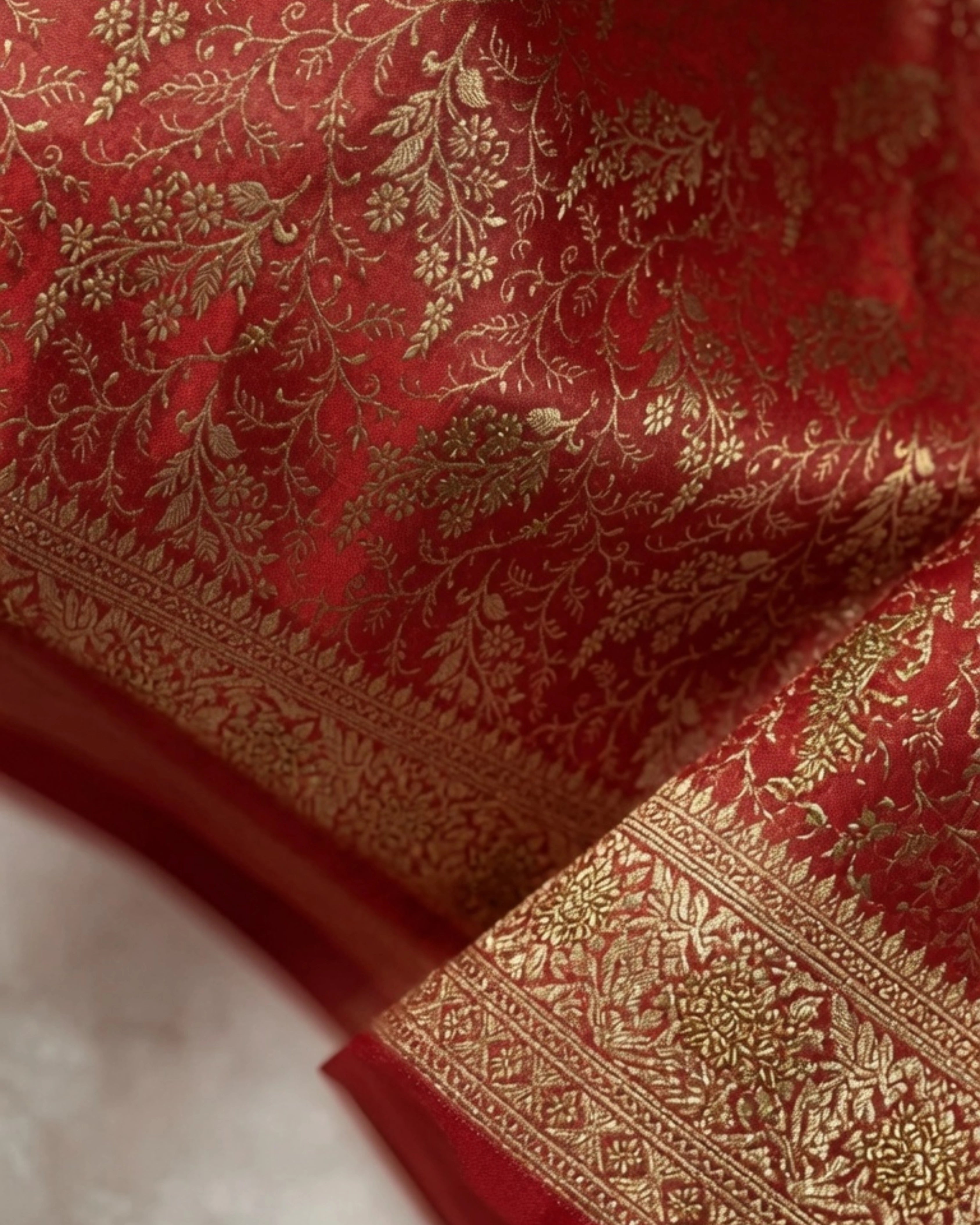 Orange Banarasi Silk Saree with All-Over Gold Zari Floral Design and Matching Blouse