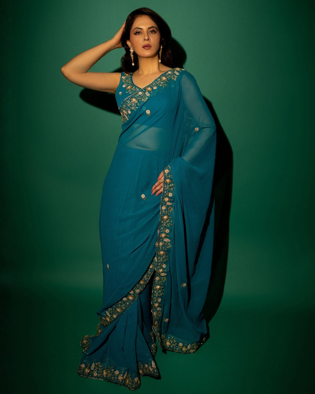 Peacock Blue Hand Embroidered Georgette Saree and Matching Floral Embroidered Blouse