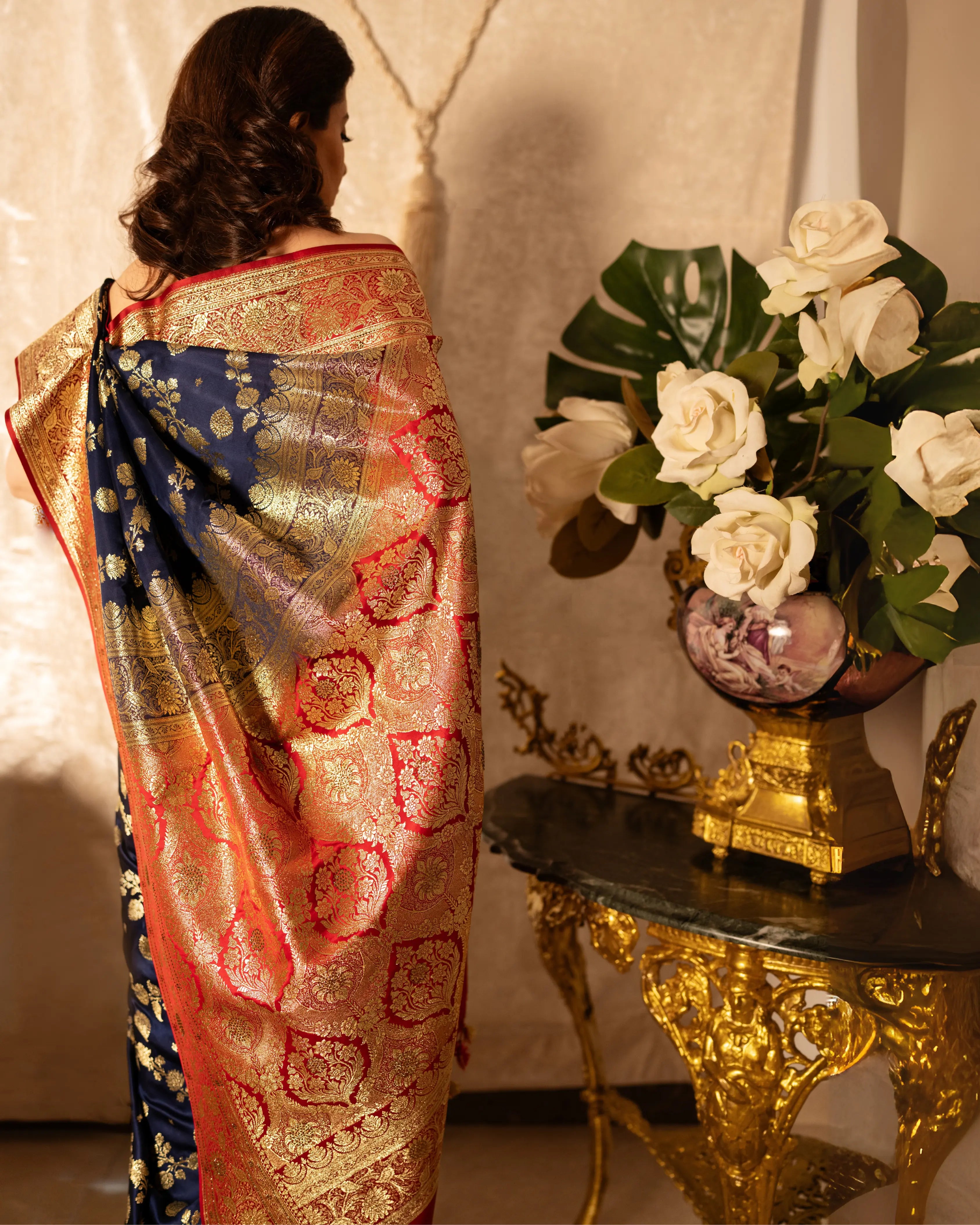 Red and Blue Dual Tone Pure Banarasi Saree with All-Over Floral and Hand Embroidery Border.