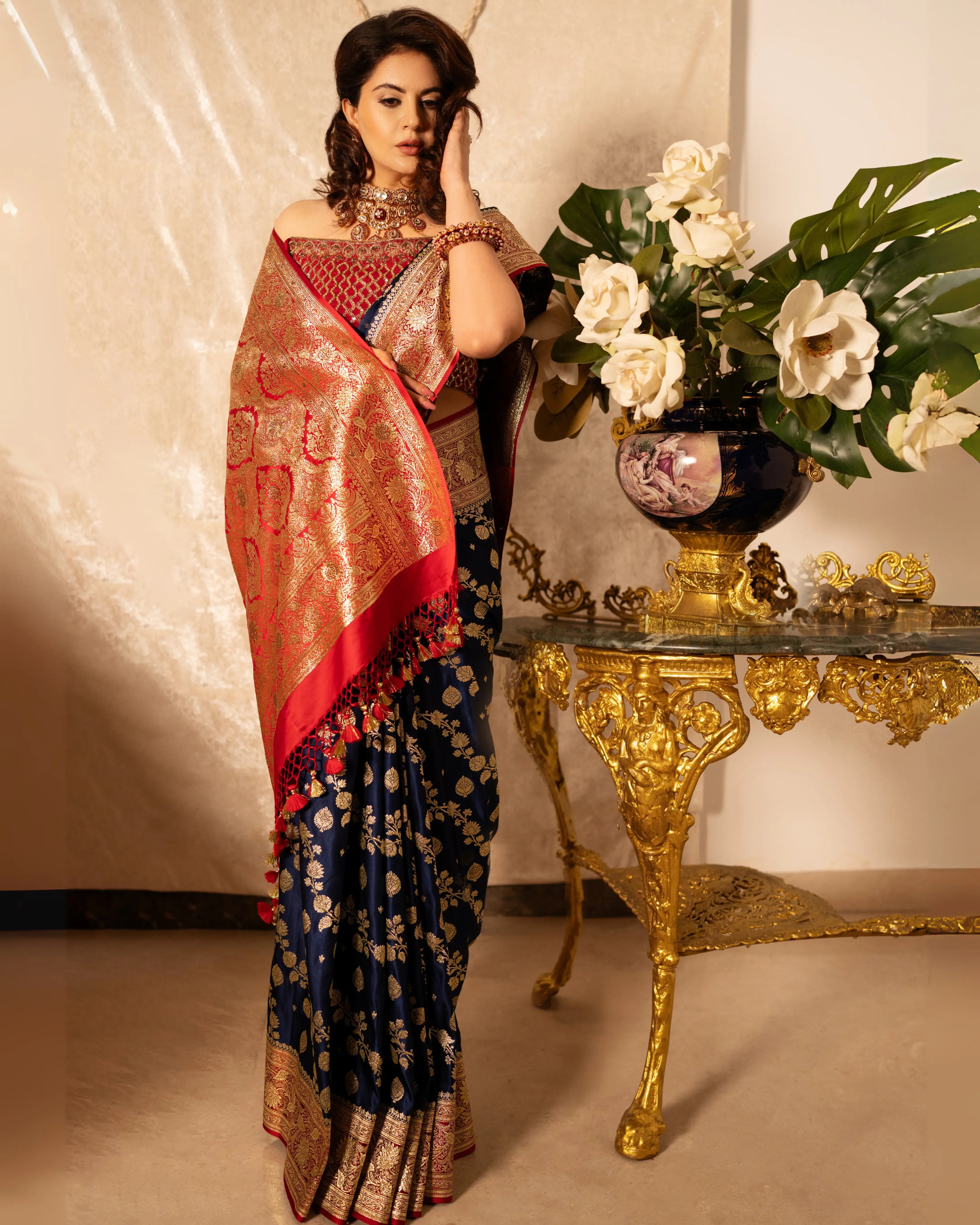 Red and Blue Dual Tone Pure Banarasi Saree with All-Over Floral and Hand Embroidery Border.