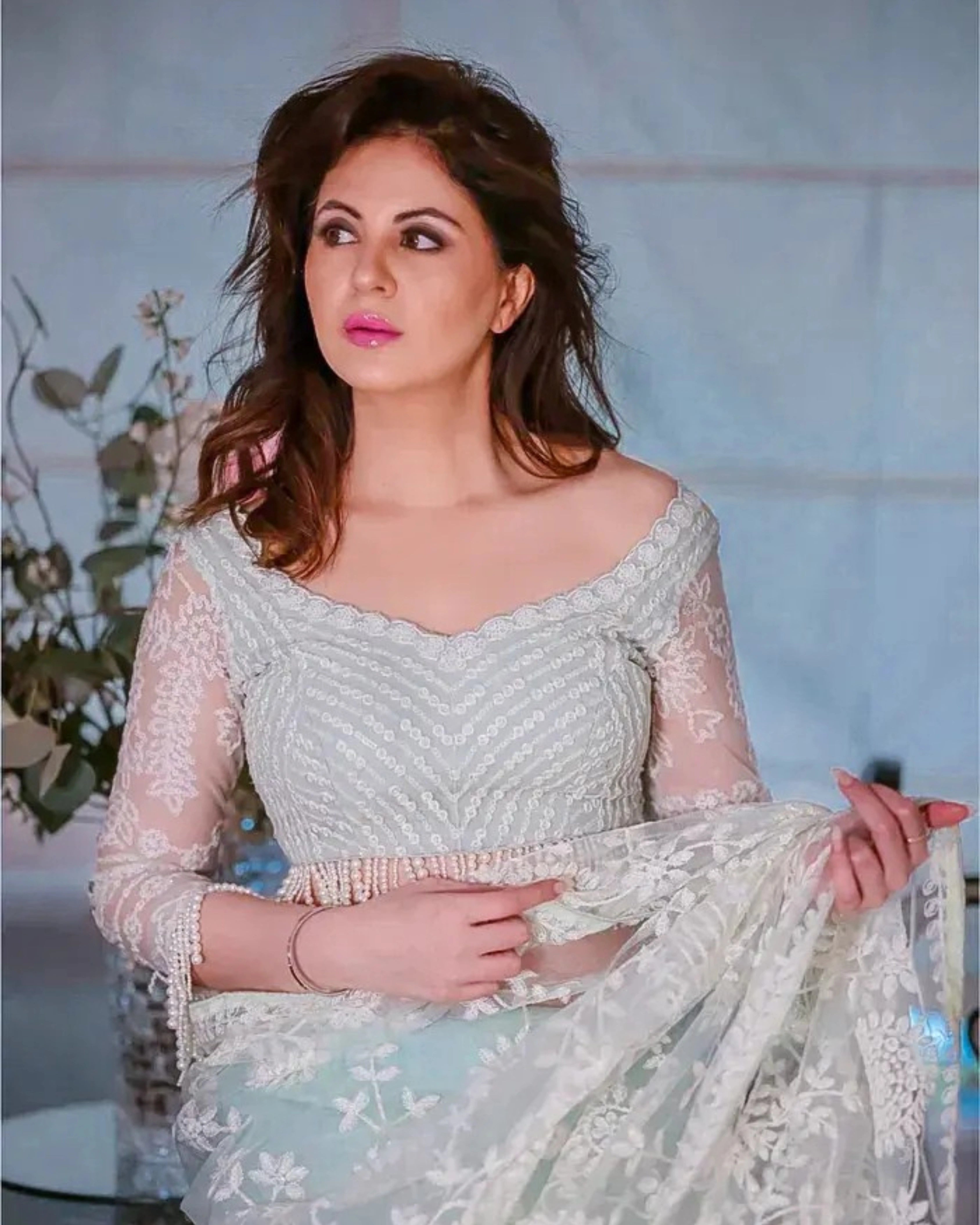 Mint Green and White Net Saree with Floral Stone Work Heavy Sequin Embroidery and a Matching Full Sleeves Blouse