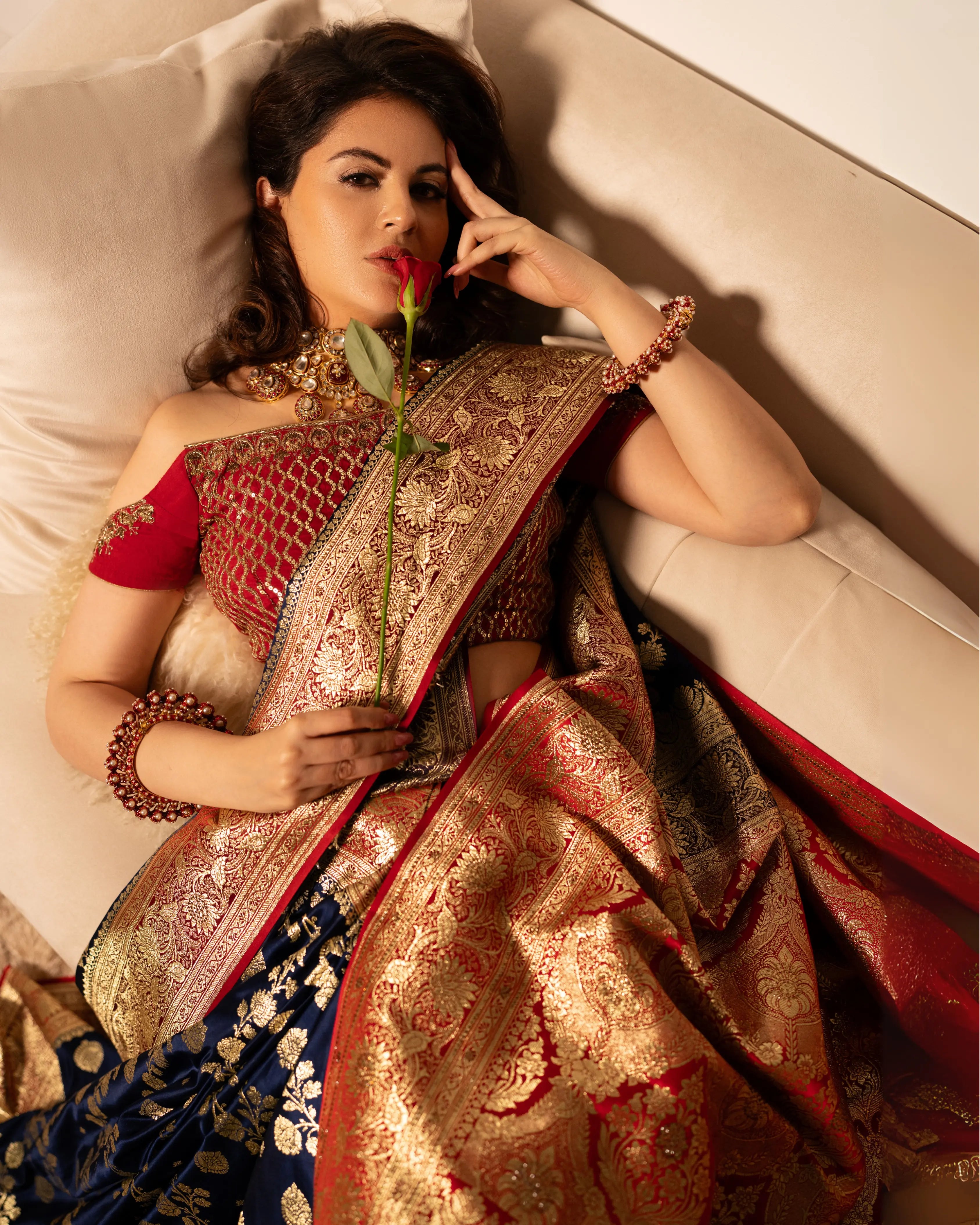 Red and Blue Dual Tone Pure Banarasi Saree with All-Over Floral and Hand Embroidery Border.