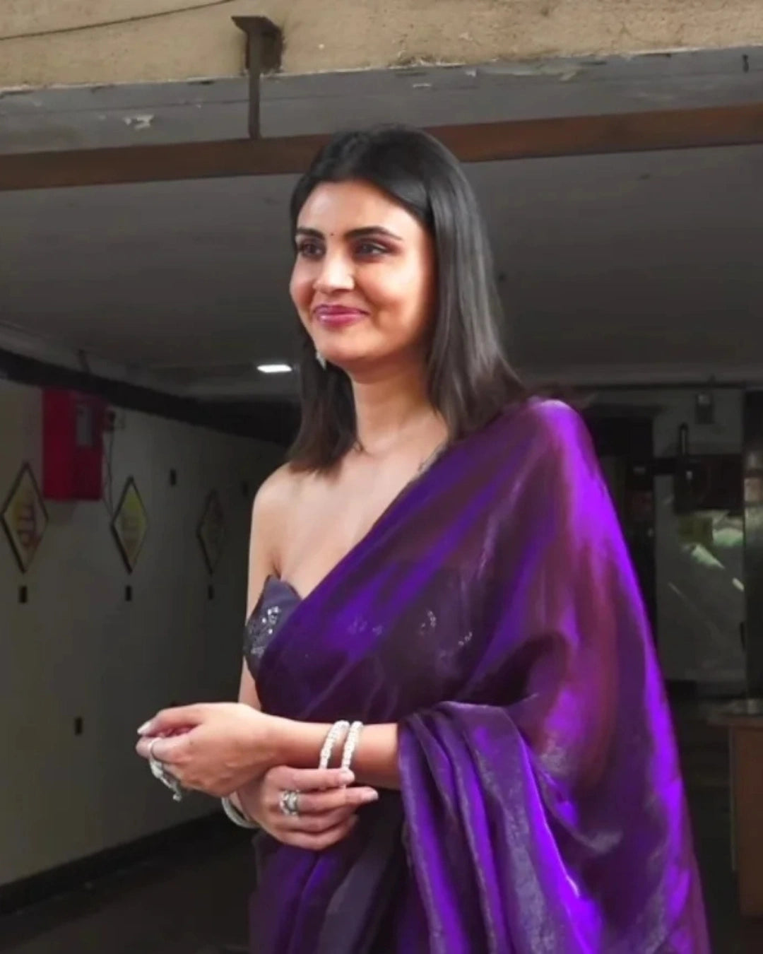 Purple Greorgette Saree with Matching Strapless Floral-Embroidered Blouse