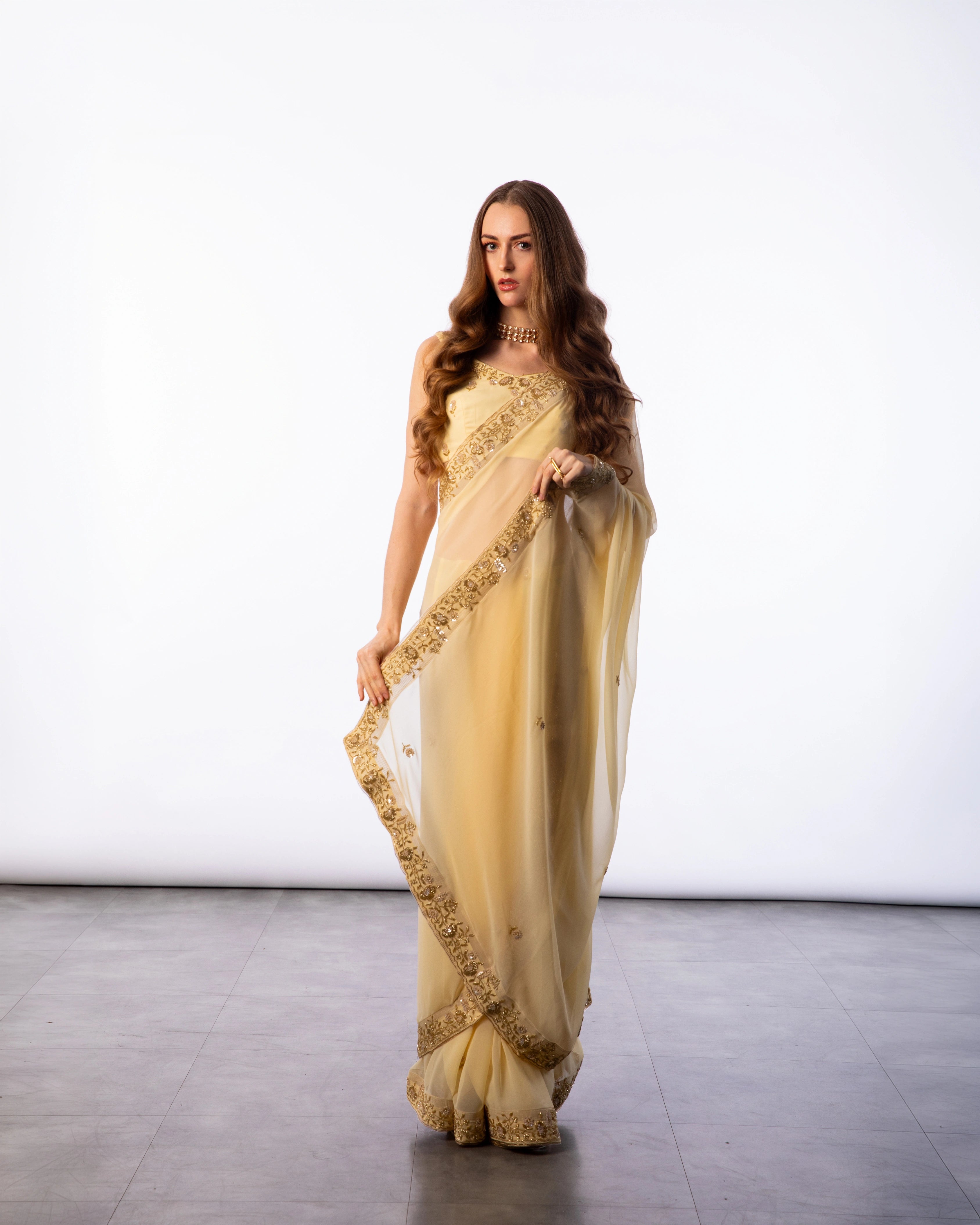 Yellow Hand Embroidered Georgette Saree and Matching Floral Embroidered Blouse