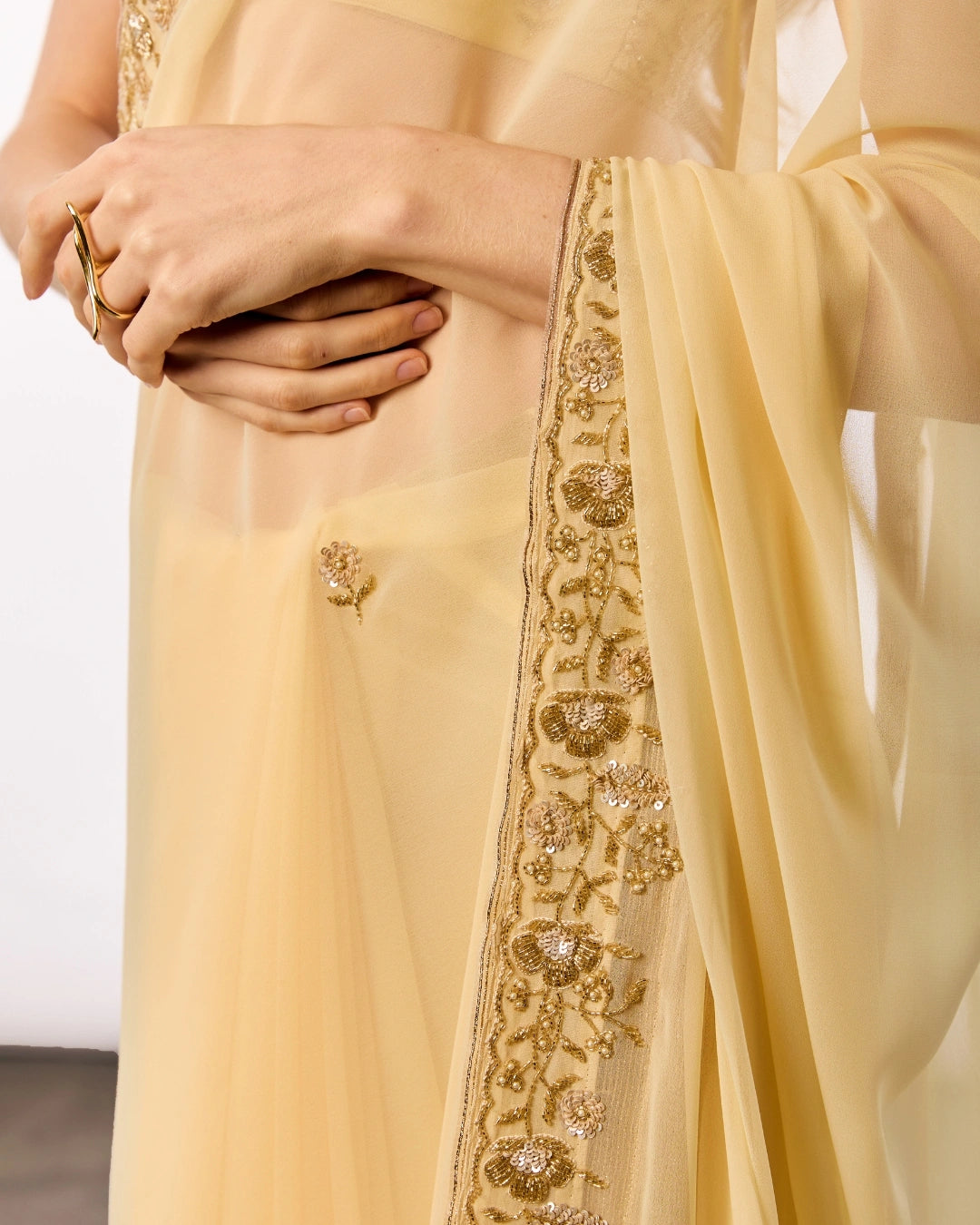 Yellow Hand Embroidered Georgette Saree and Matching Floral Embroidered Blouse