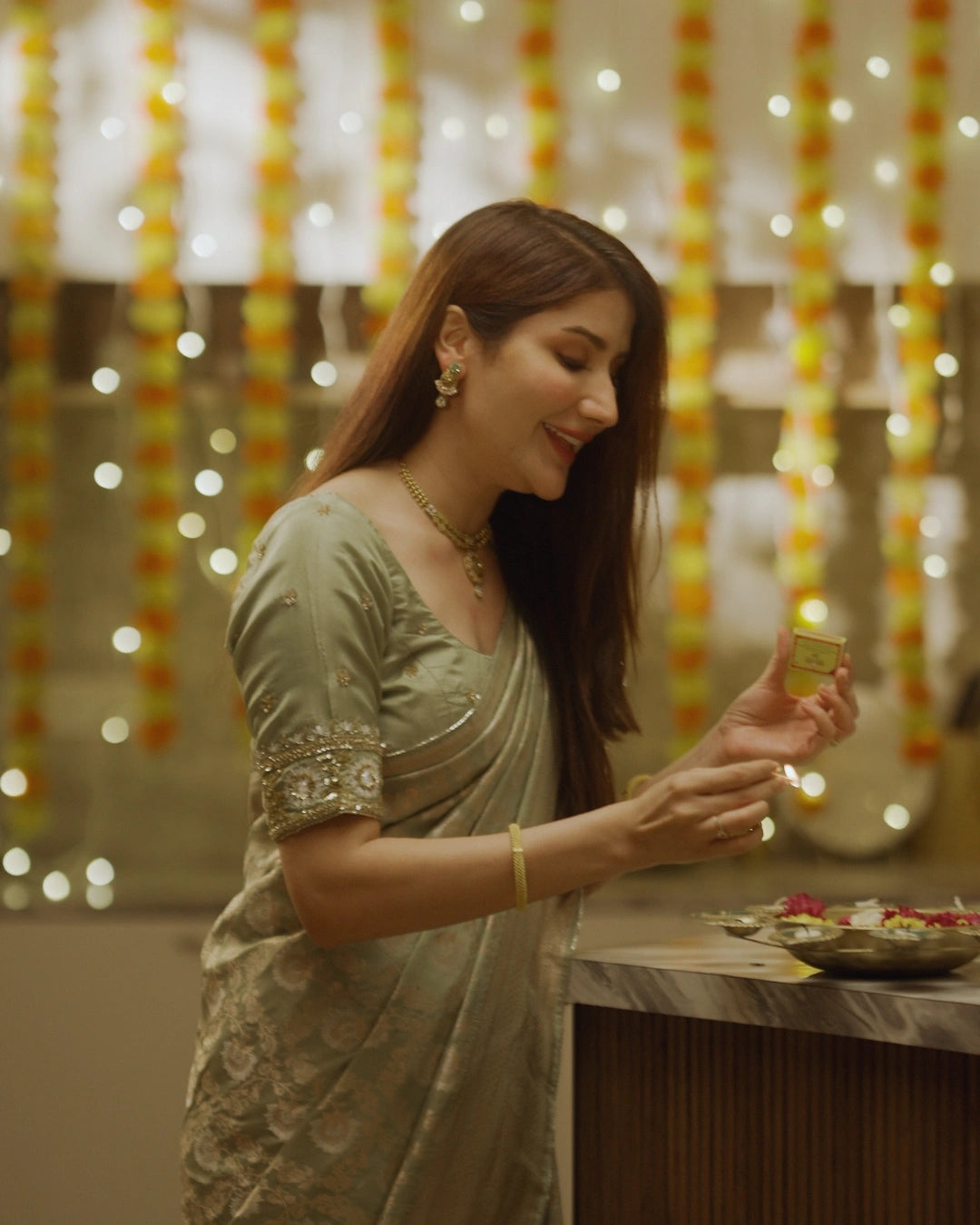Light Green Pure Banarasi Silk Saree with Gold Floral Design and Matching Blouse.