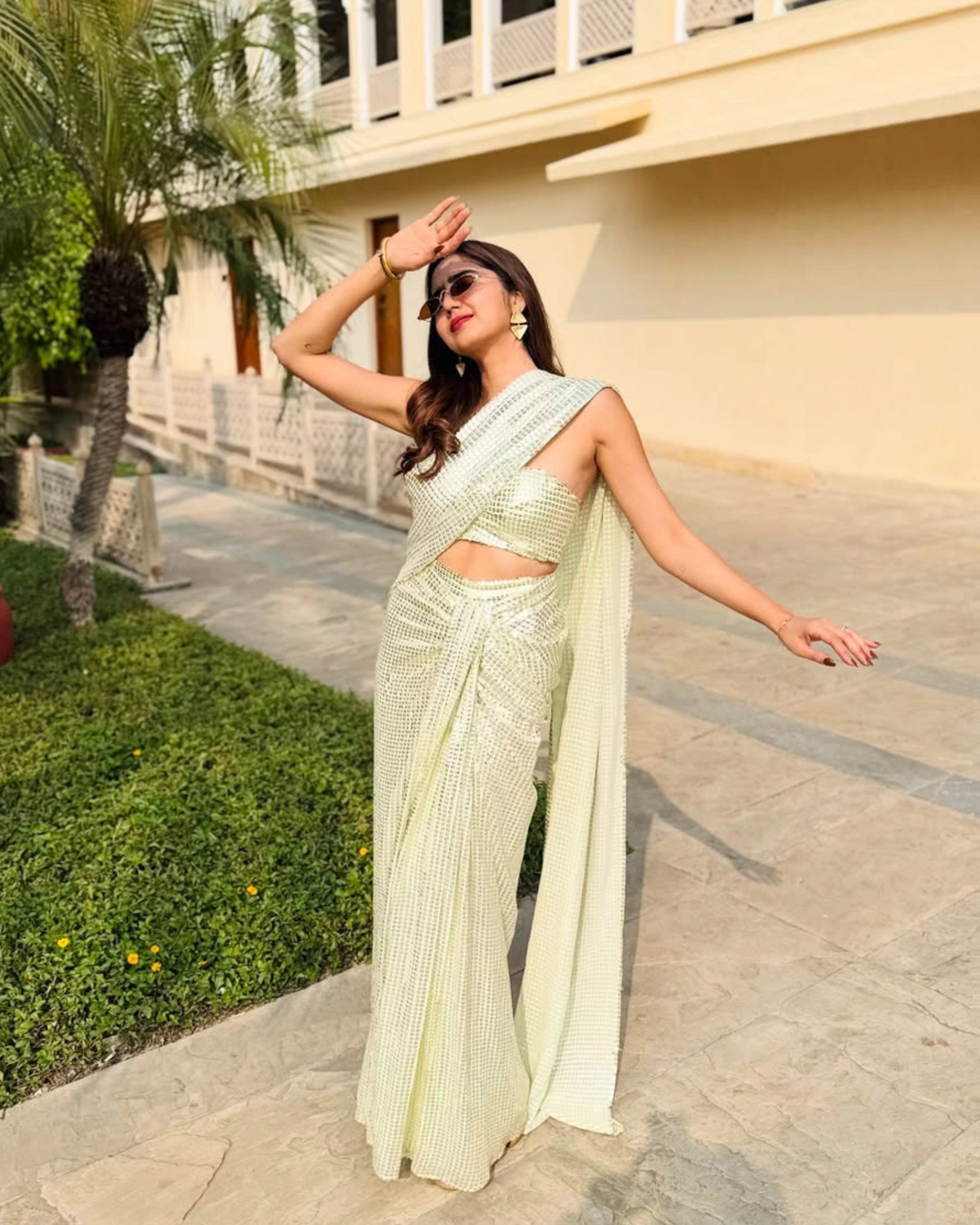 Yellow Georgette Saree with All-Over Gold Sequin Work