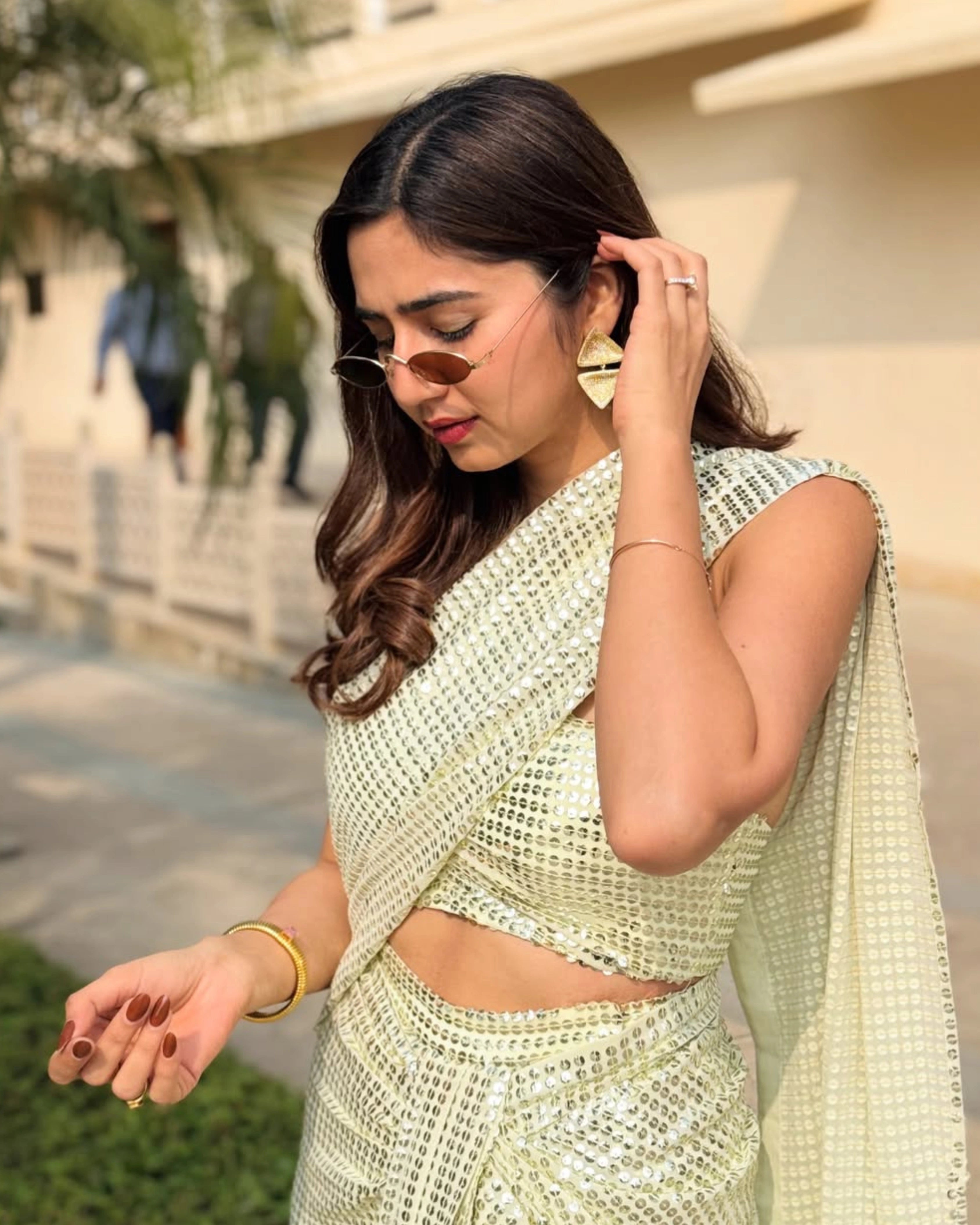Yellow Georgette Saree with All-Over Gold Sequin Work