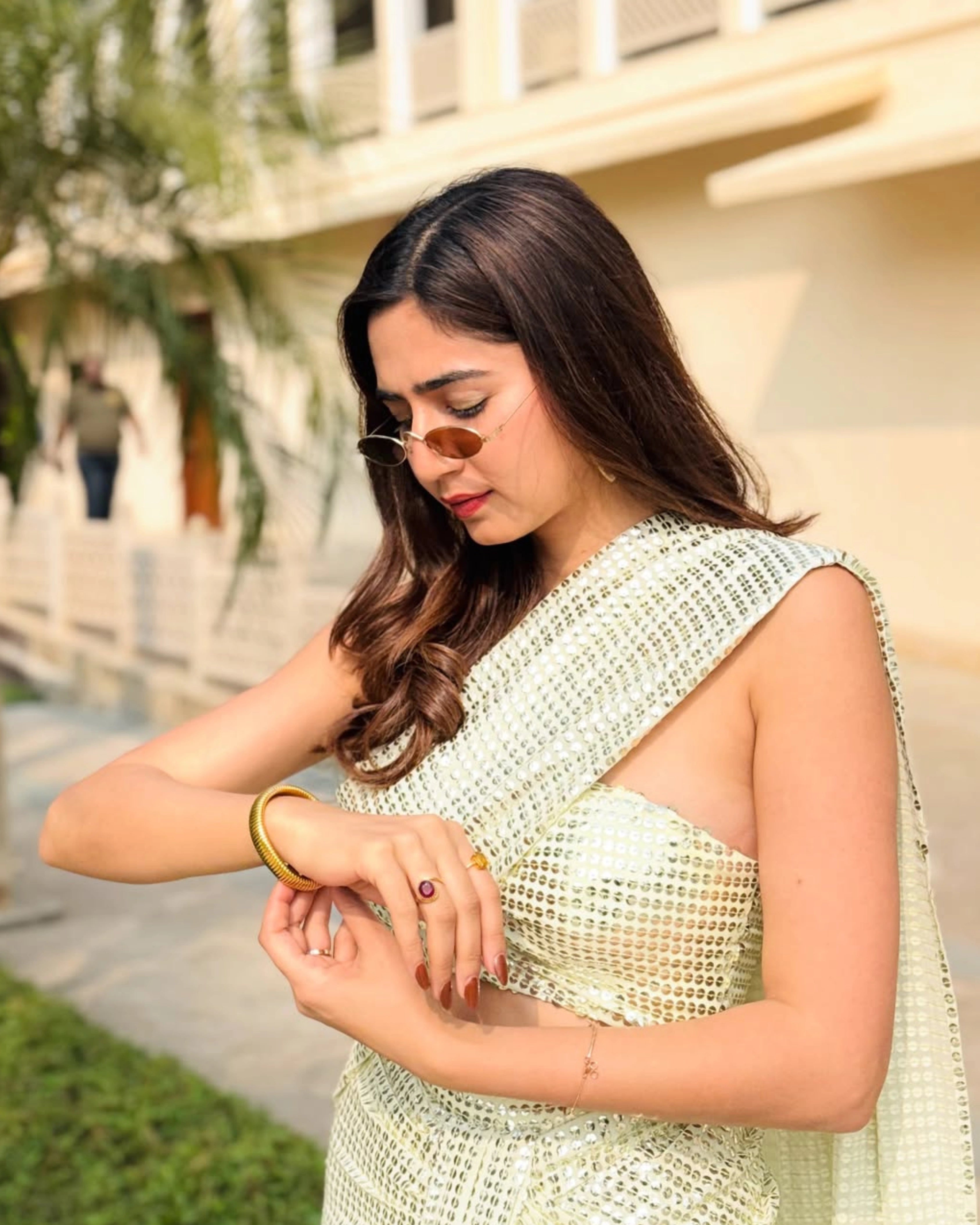 Yellow Georgette Saree with All-Over Gold Sequin Work