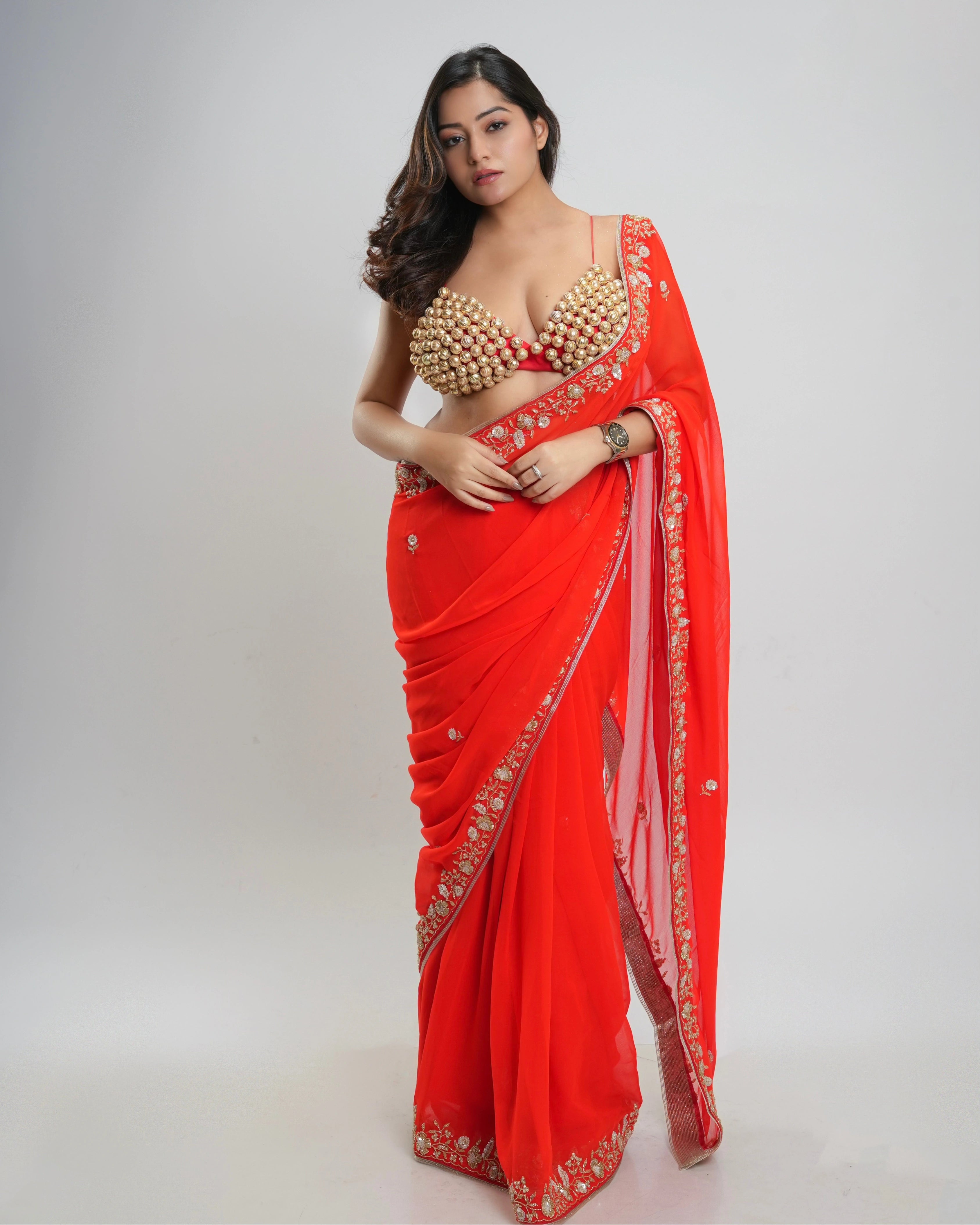Orange Hand Embroidered Georgette Saree and Customized Blouse