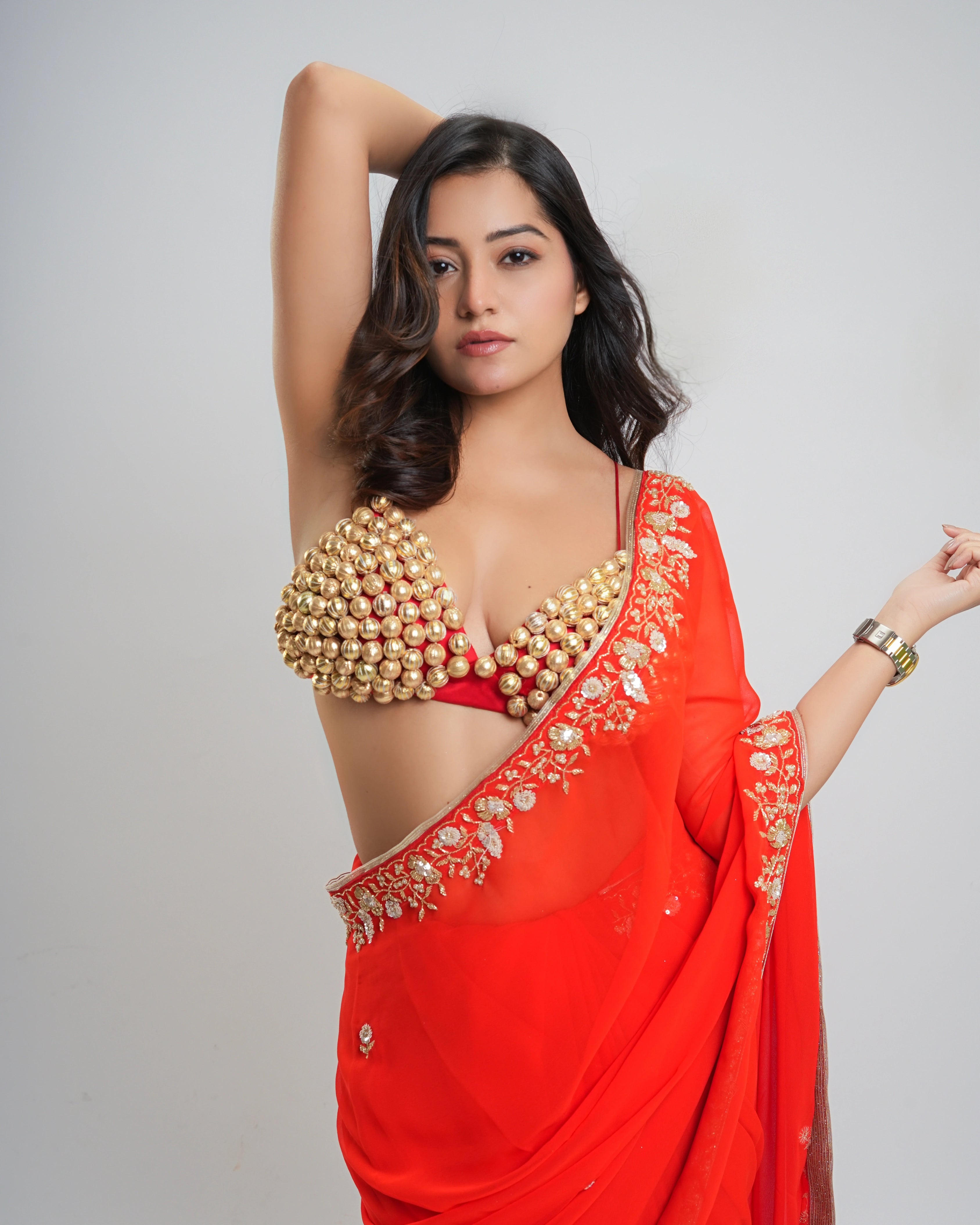 Orange Hand Embroidered Georgette Saree and Customized Blouse